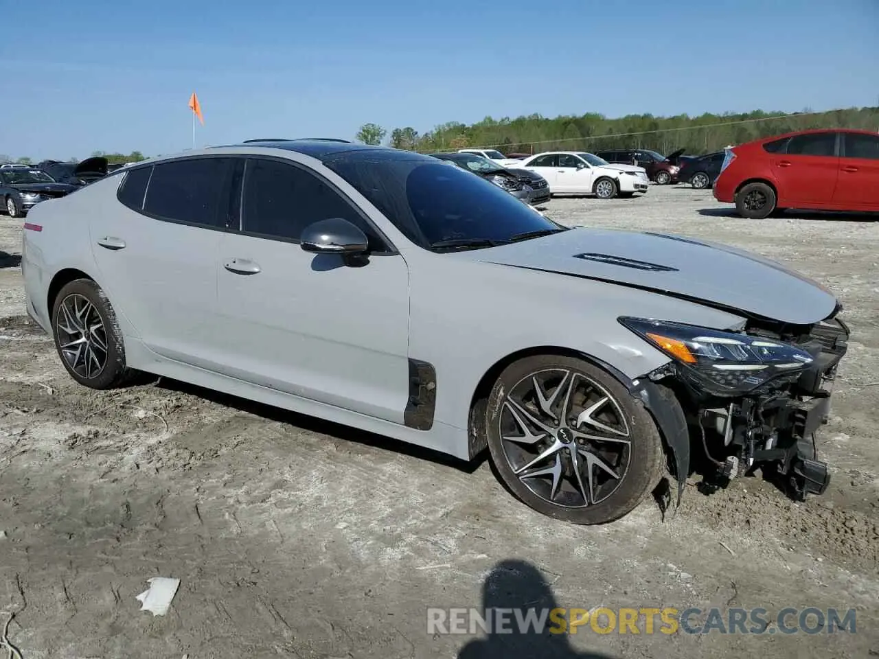 4 Photograph of a damaged car KNAE35LD0N6116390 KIA STINGER 2022