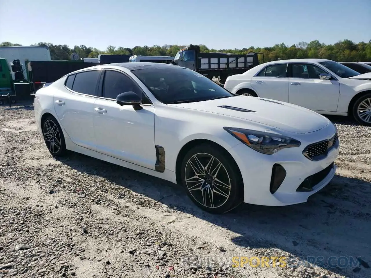 4 Photograph of a damaged car KNAE55LC3N6101660 KIA STINGER 2022