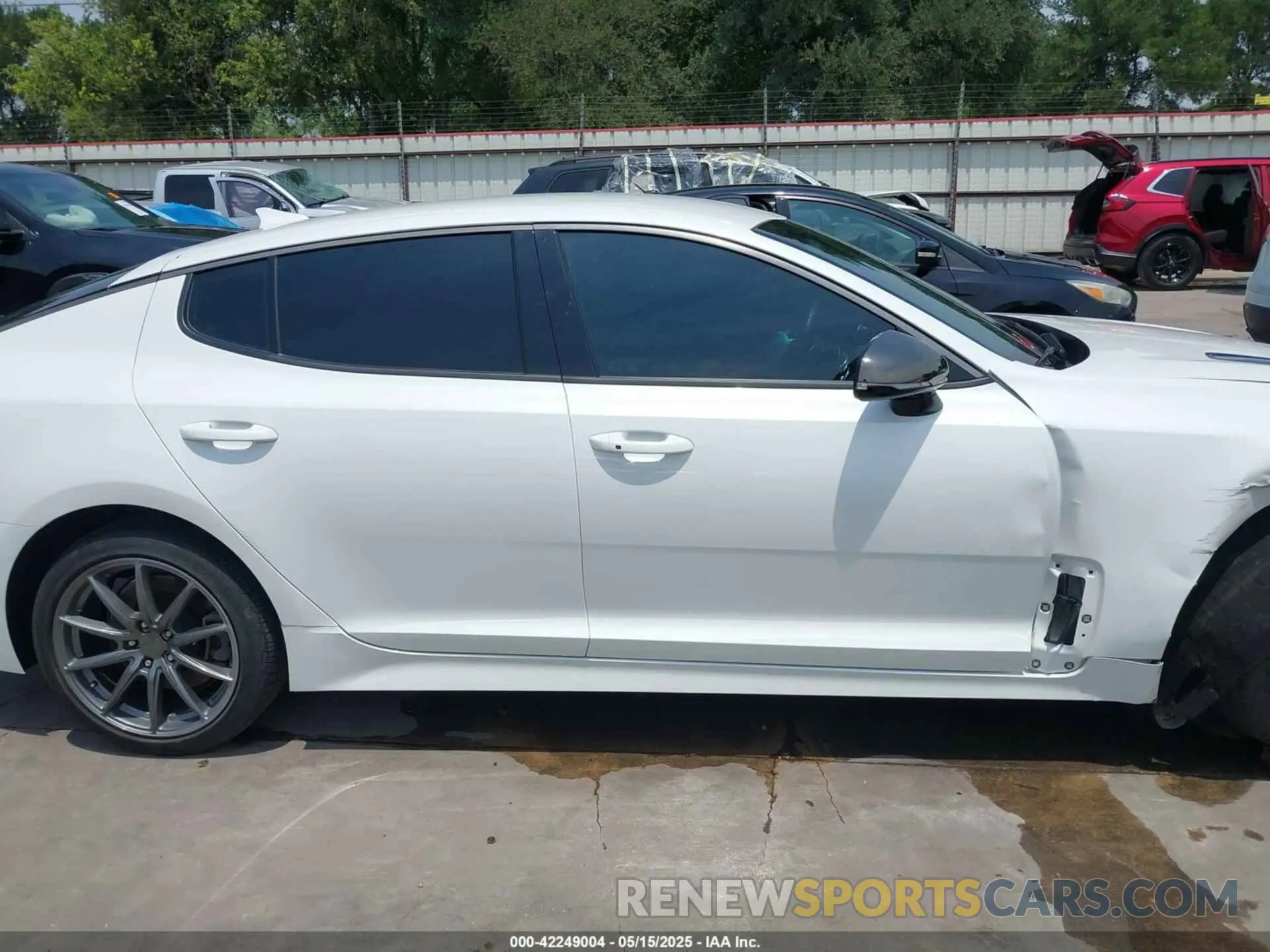 14 Photograph of a damaged car KNAE35LD8P6132386 KIA STINGER 2023