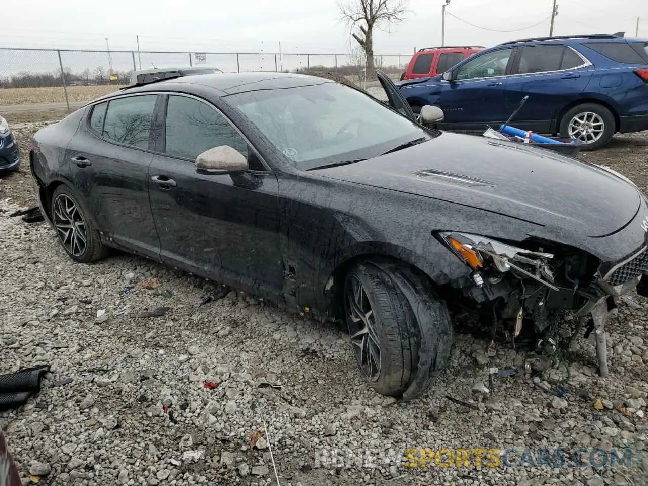4 Photograph of a damaged car KNAE35LD9P6125169 KIA STINGER 2023