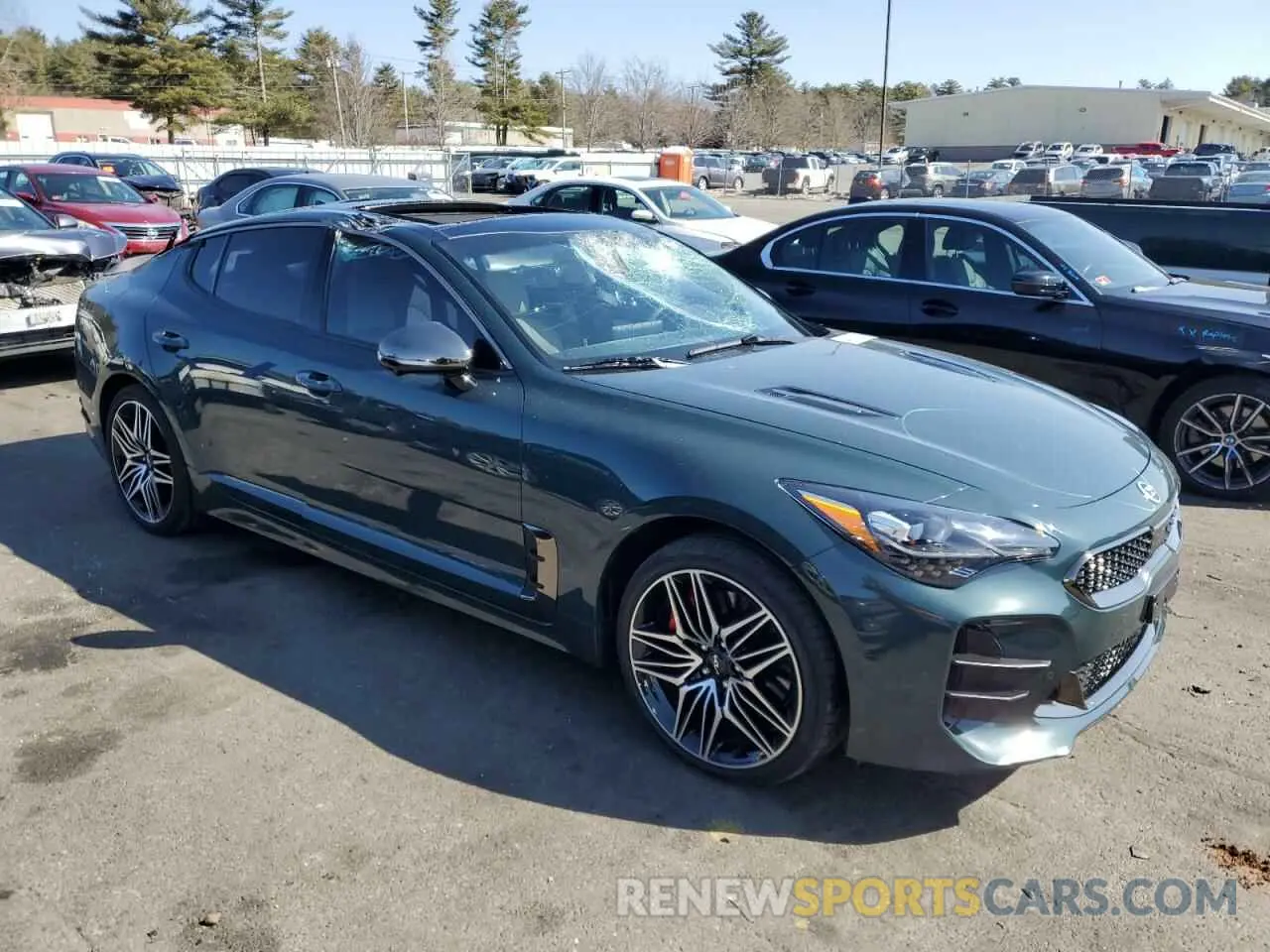 4 Photograph of a damaged car KNAE55LC3P6122804 KIA STINGER 2023