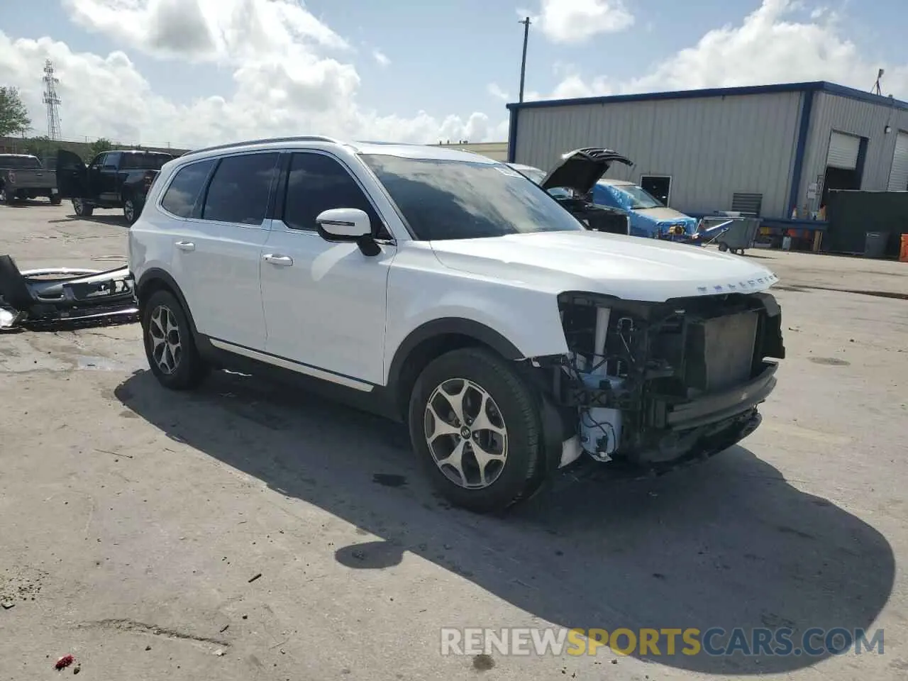 4 Photograph of a damaged car 5XYP34HC9LG032259 KIA TELLURIDE 2020