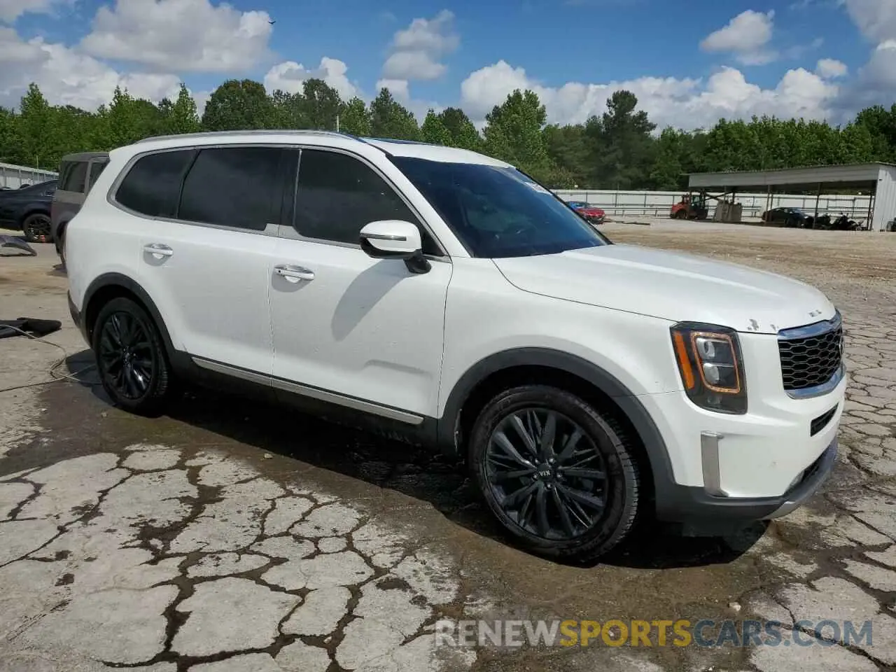 4 Photograph of a damaged car 5XYP5DHC0LG017305 KIA TELLURIDE 2020