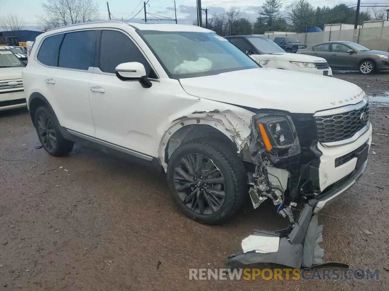 4 Photograph of a damaged car 5XYP54HC8MG158219 KIA TELLURIDE 2021