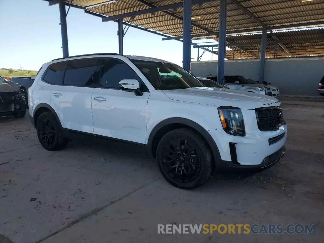 4 Photograph of a damaged car 5XYP5DHC7MG142707 KIA TELLURIDE 2021