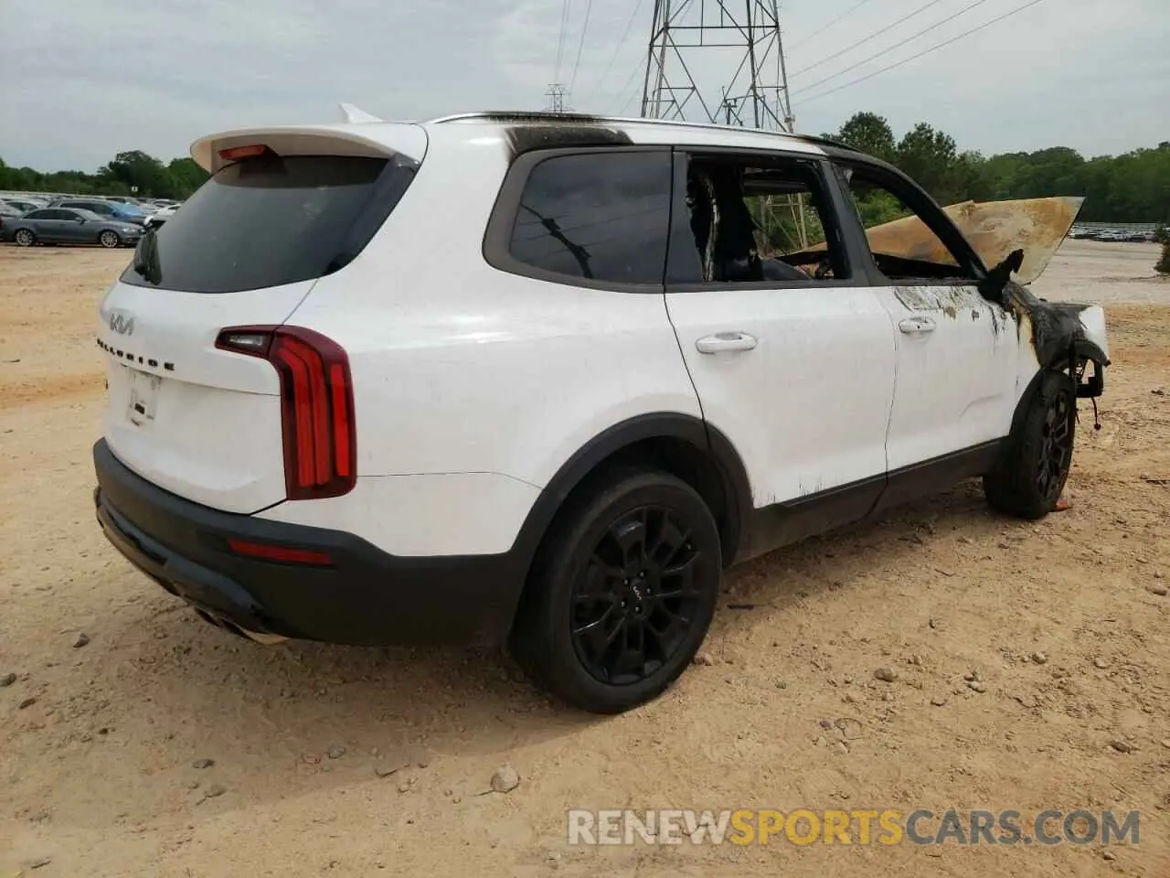 3 Photograph of a damaged car 5XYP3DHC0NG324580 KIA TELLURIDE 2022