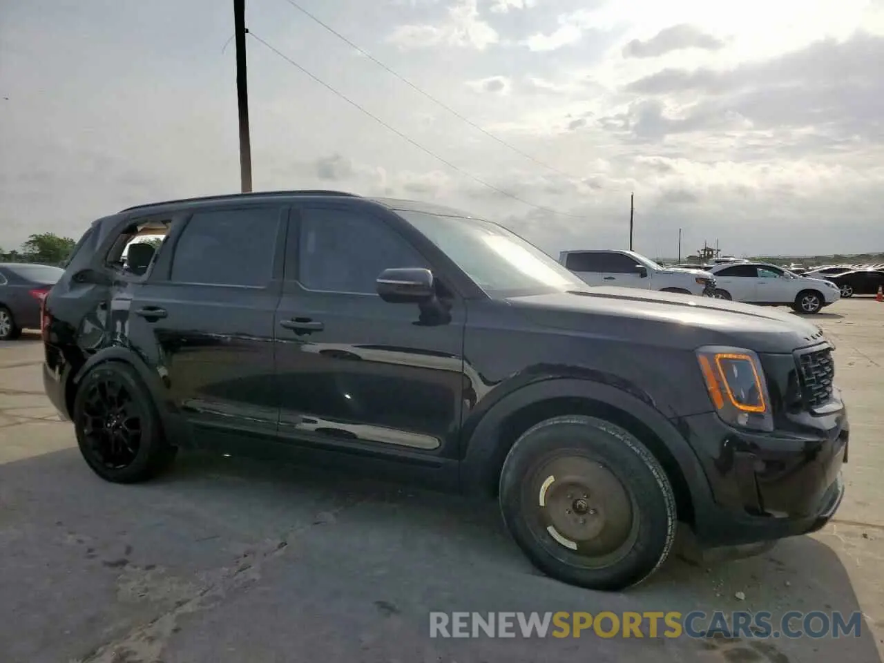 4 Photograph of a damaged car 5XYP3DHC6NG251537 KIA TELLURIDE 2022