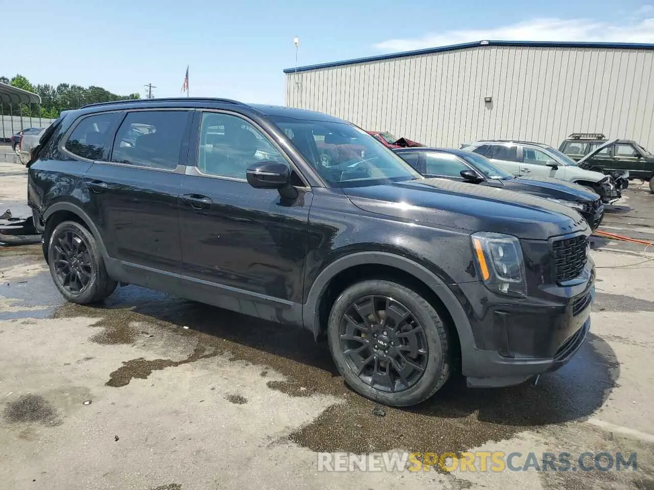 4 Photograph of a damaged car 5XYP3DHC8NG235016 KIA TELLURIDE 2022