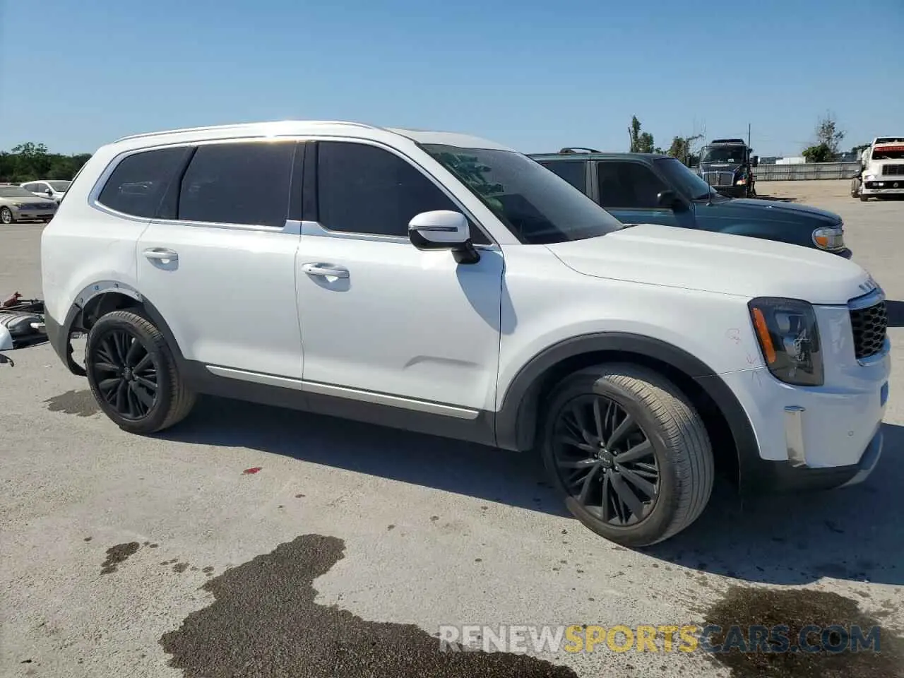 4 Photograph of a damaged car 5XYP54HC1NG297027 KIA TELLURIDE 2022