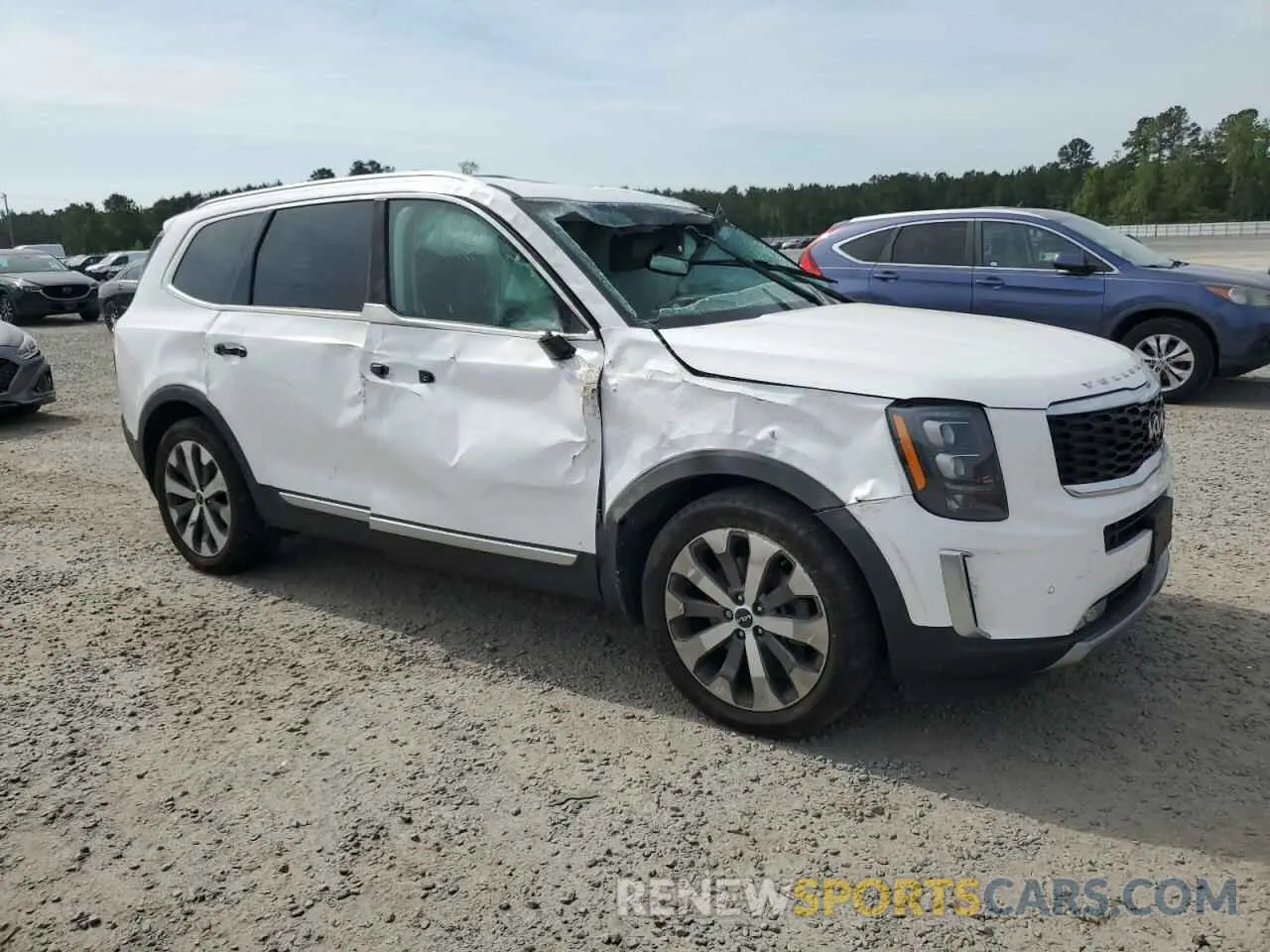 4 Photograph of a damaged car 5XYP5DHC4NG197102 KIA TELLURIDE 2022