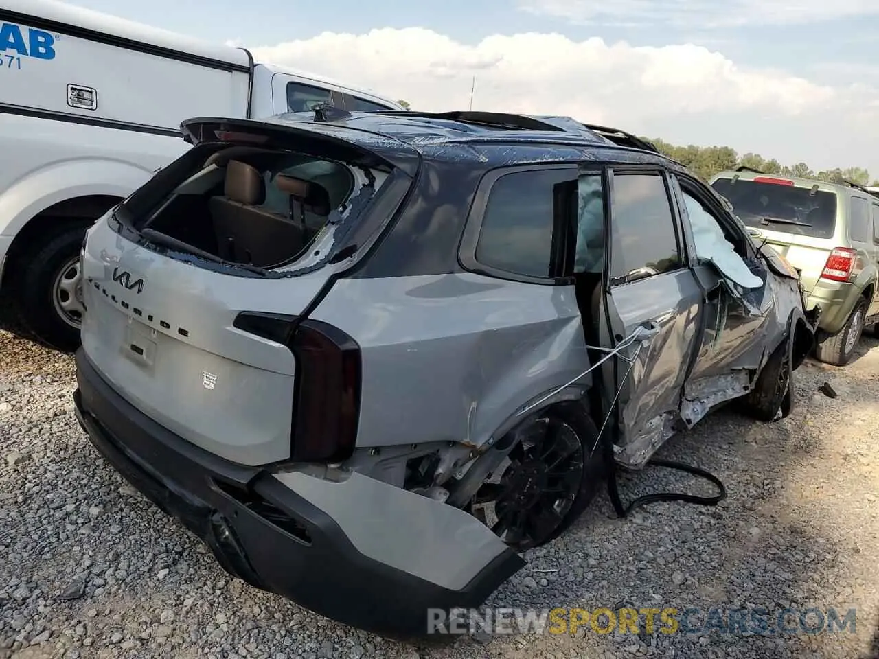 3 Photograph of a damaged car 5XYP5DHC4NG291268 KIA TELLURIDE 2022