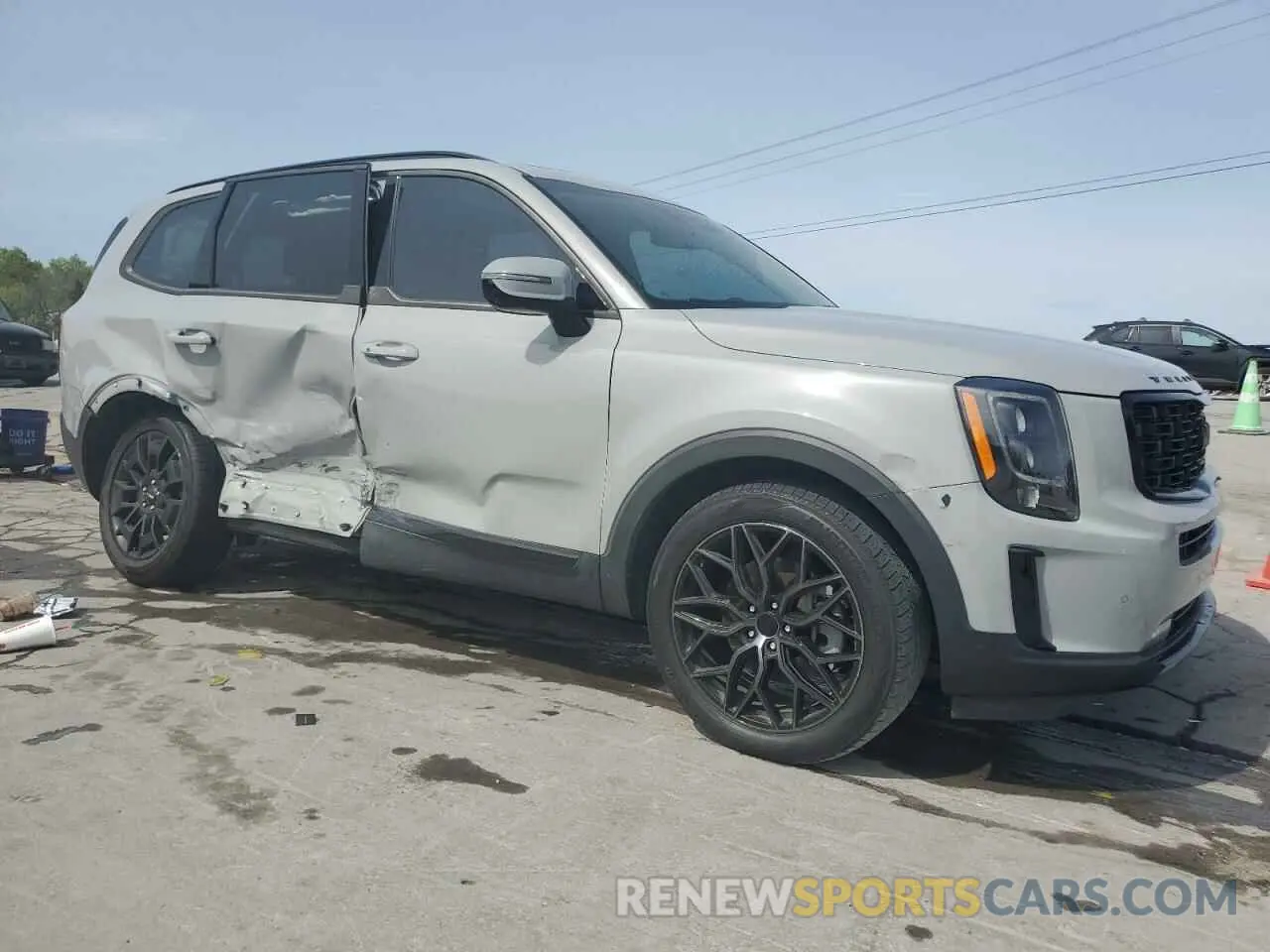 4 Photograph of a damaged car 5XYP5DHC9NG193403 KIA TELLURIDE 2022