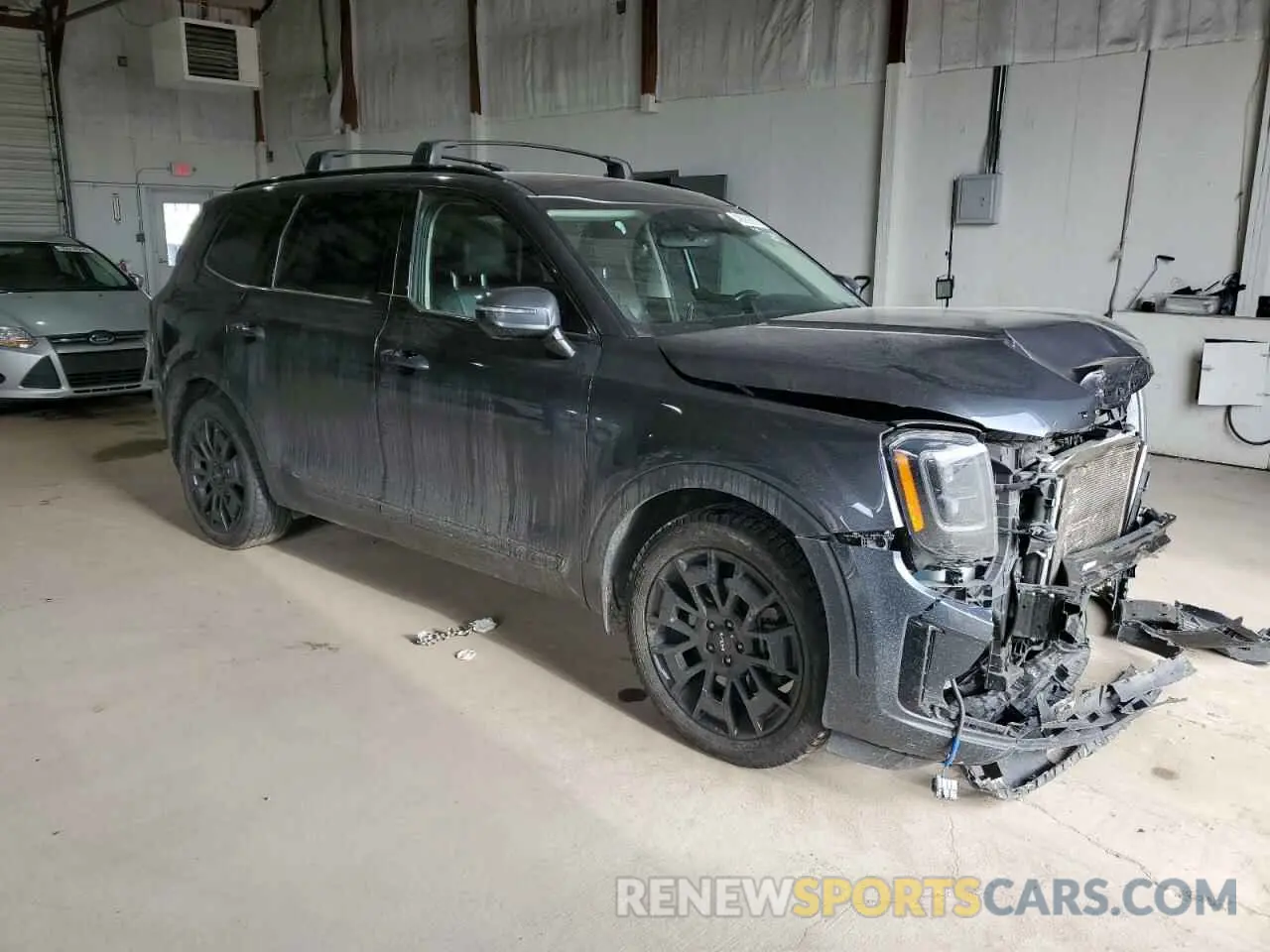 4 Photograph of a damaged car 5XYP5DHC9NG193935 KIA TELLURIDE 2022