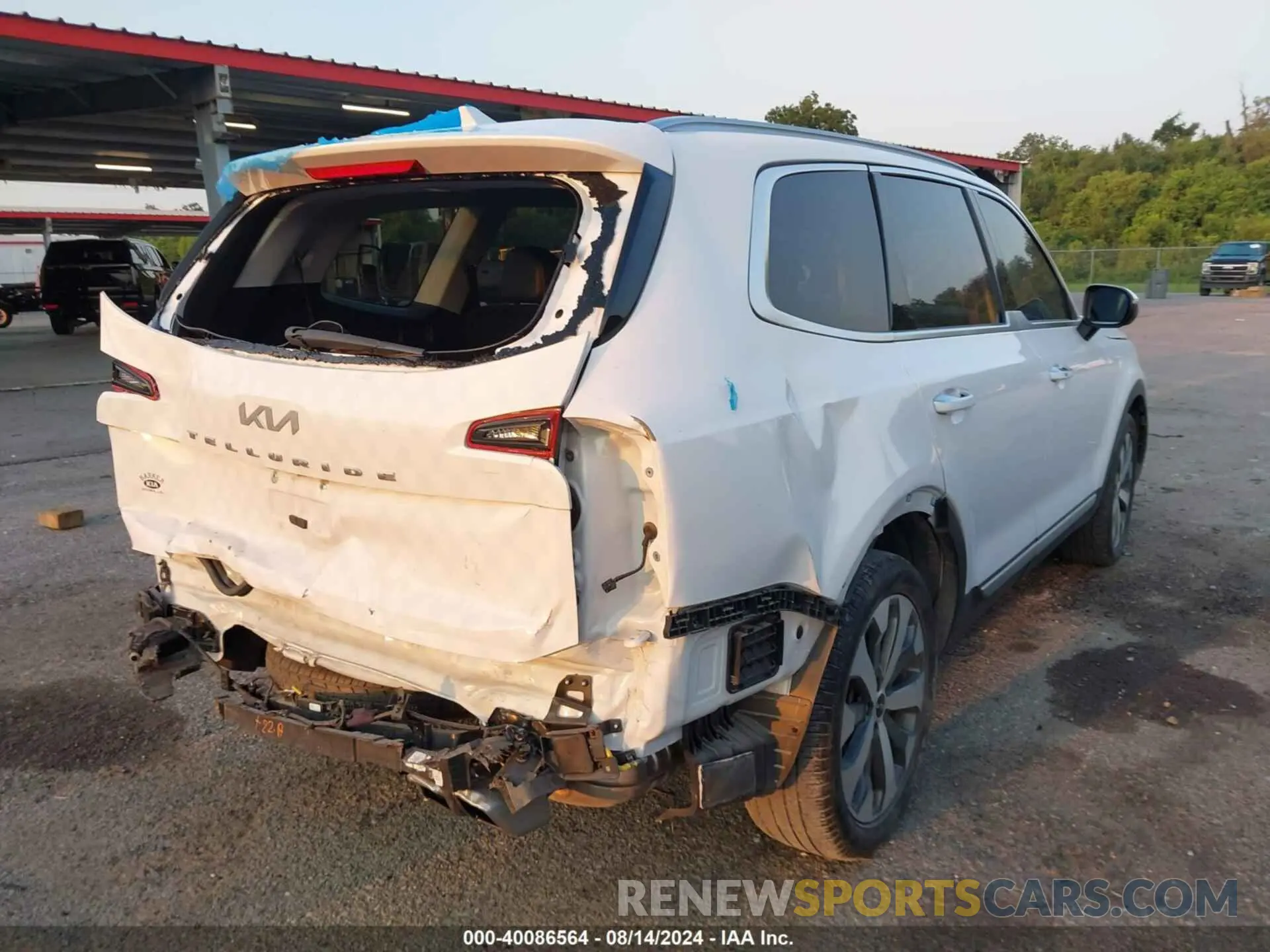 4 Photograph of a damaged car 5XYP64HC1NG310548 KIA TELLURIDE 2022