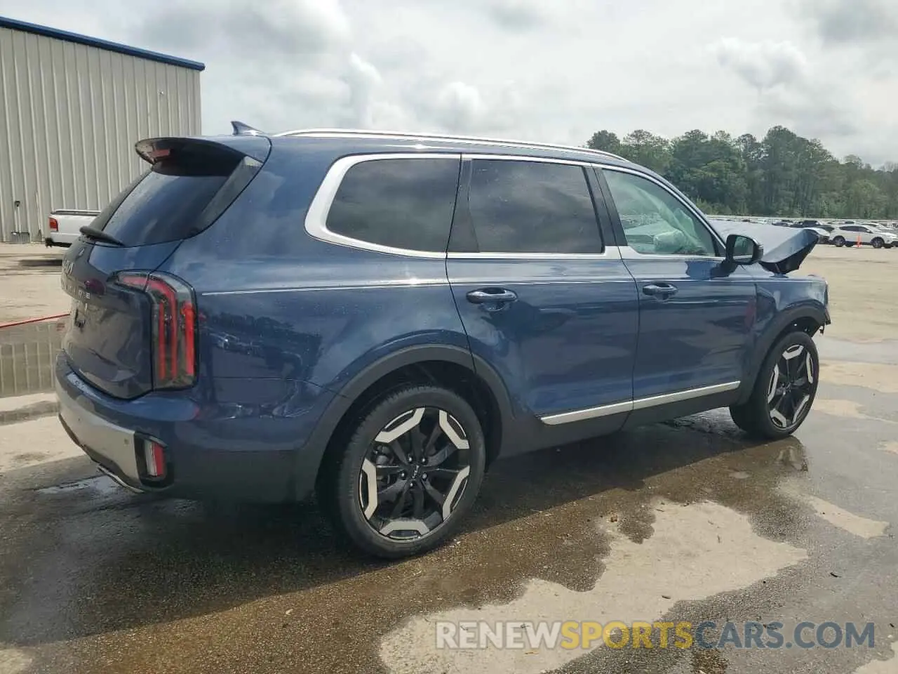 3 Photograph of a damaged car 5XYP34GC5PG342125 KIA TELLURIDE 2023