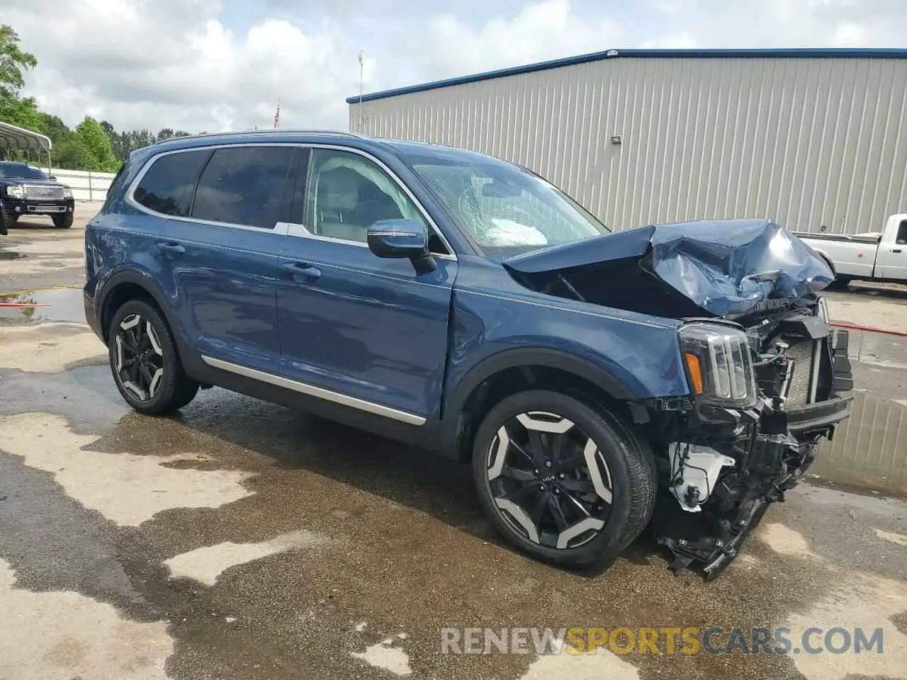 4 Photograph of a damaged car 5XYP34GC5PG342125 KIA TELLURIDE 2023