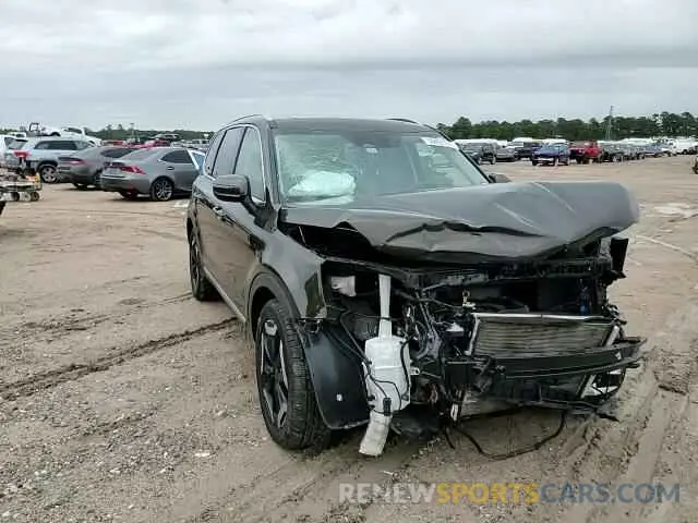11 Photograph of a damaged car 5XYP34GC7PG348752 KIA TELLURIDE 2023