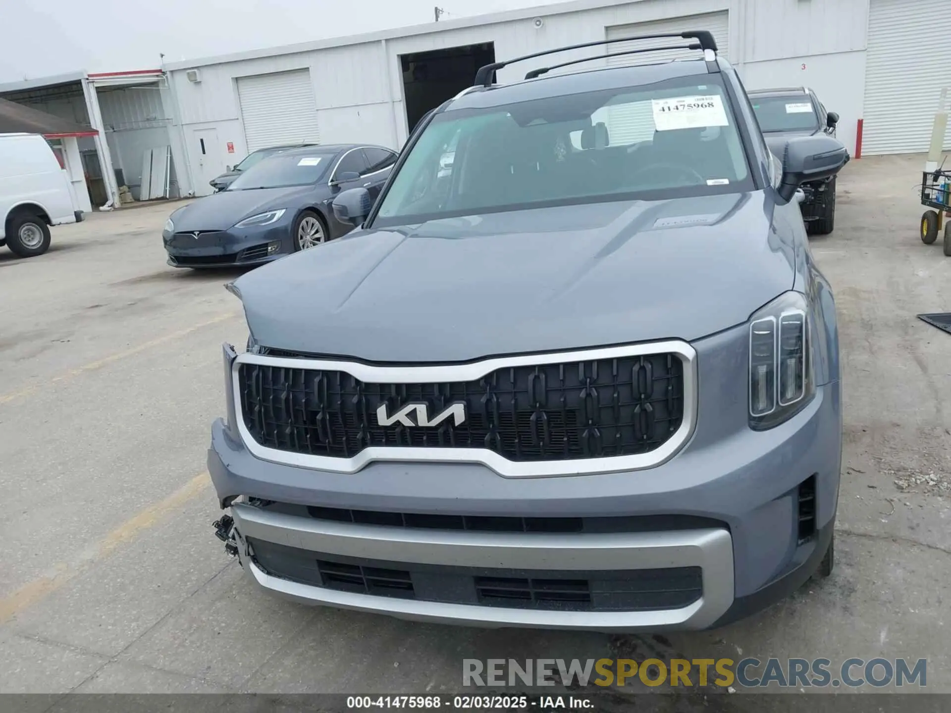 12 Photograph of a damaged car 5XYP34GC7PG356057 KIA TELLURIDE 2023