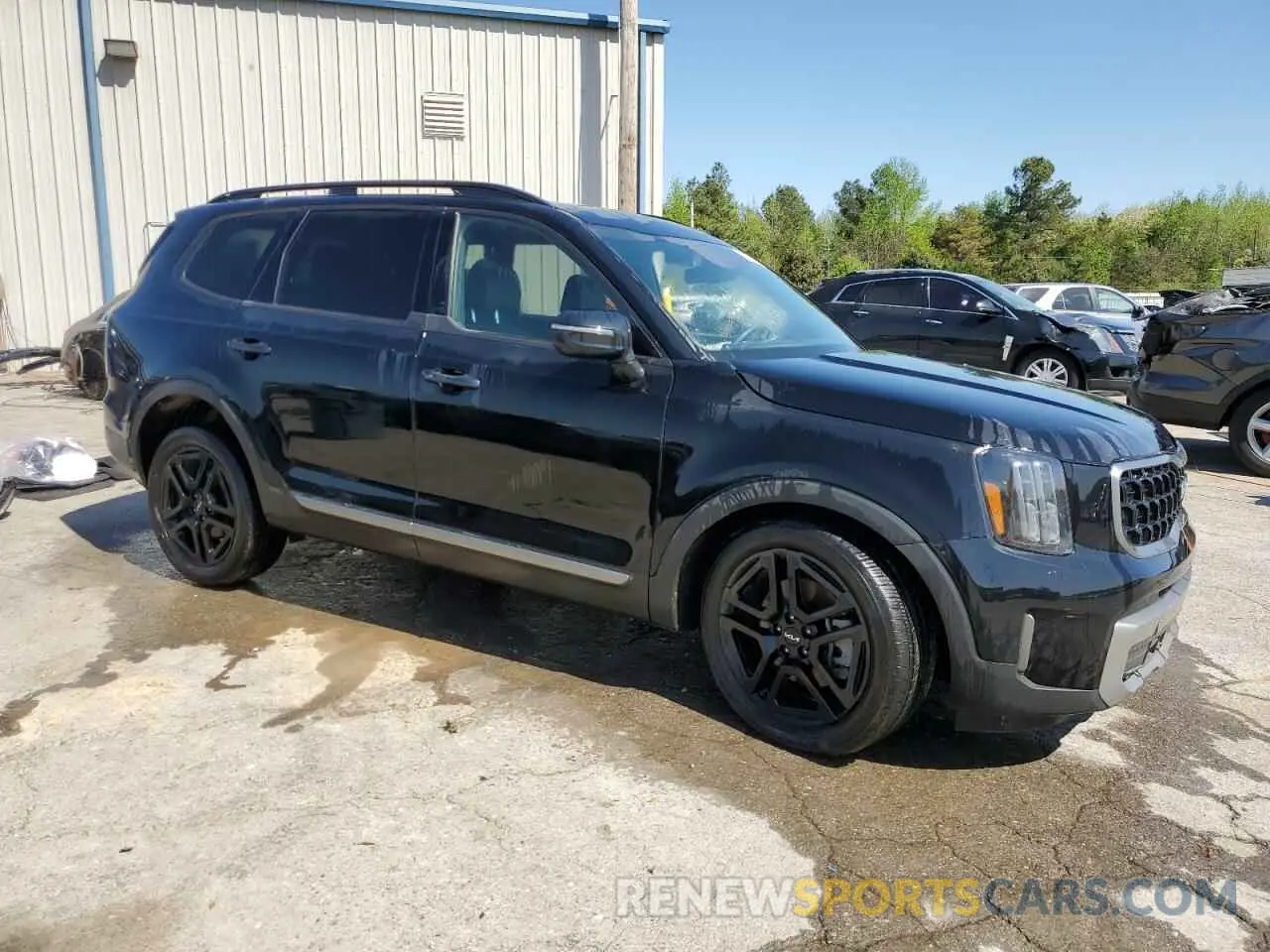 4 Photograph of a damaged car 5XYP3DGC0PG391359 KIA TELLURIDE 2023