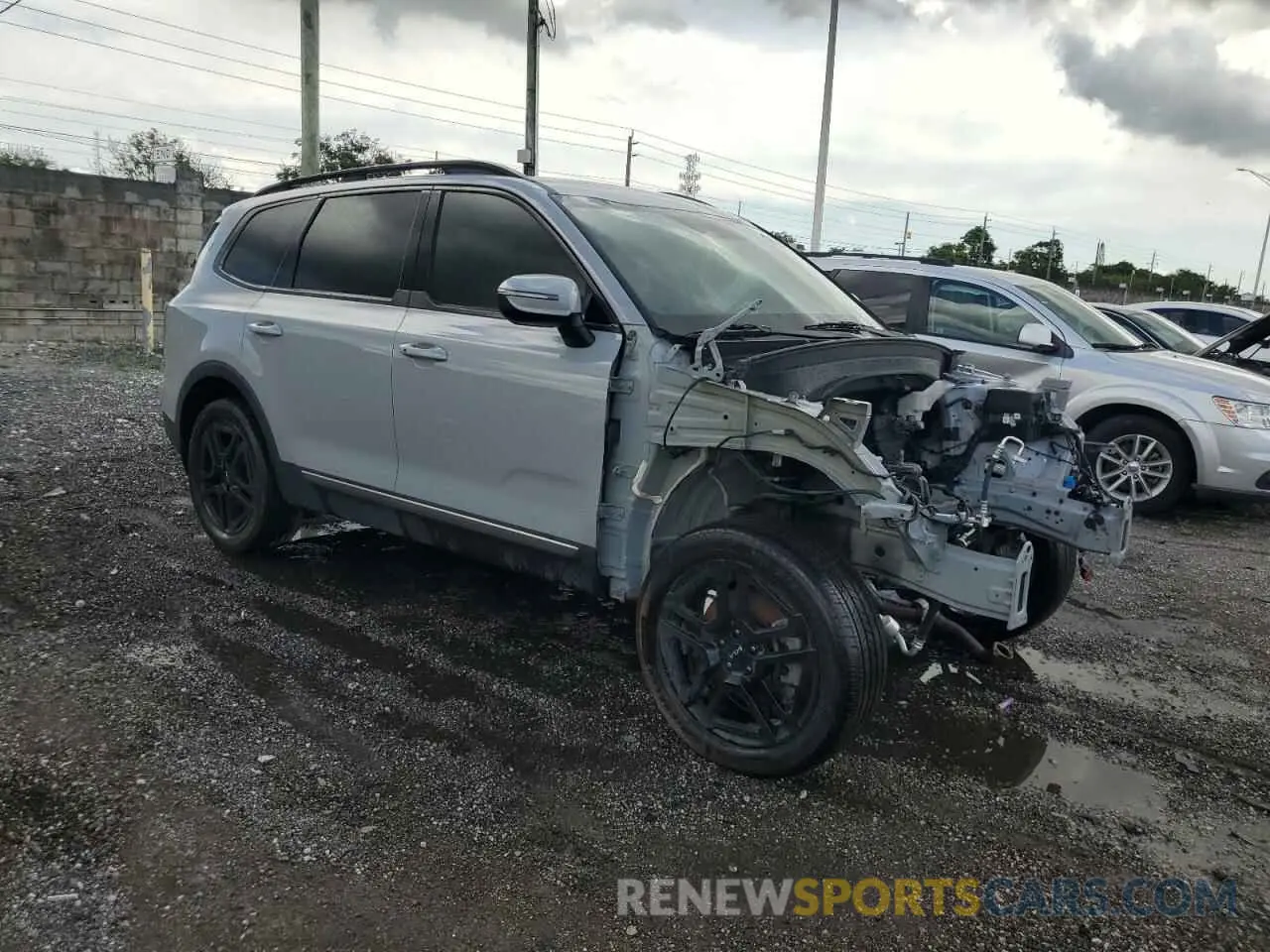 4 Photograph of a damaged car 5XYP3DGC5PG386688 KIA TELLURIDE 2023
