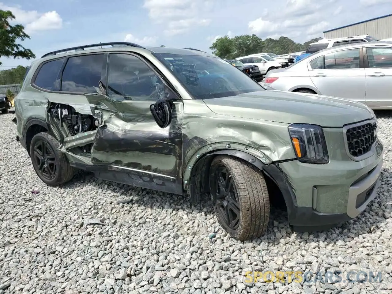 4 Photograph of a damaged car 5XYP3DGC6PG360956 KIA TELLURIDE 2023