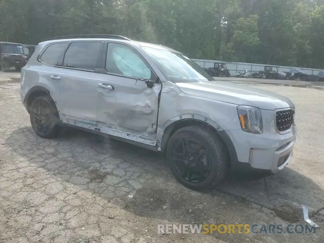4 Photograph of a damaged car 5XYP3DGC8PG391075 KIA TELLURIDE 2023