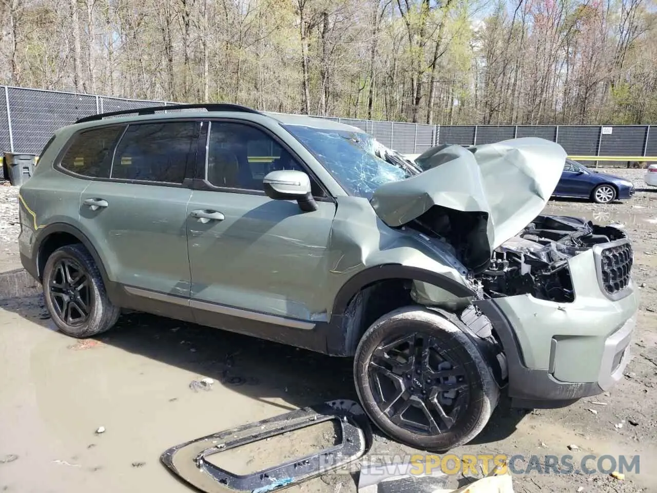 4 Photograph of a damaged car 5XYP3DGC9PG337381 KIA TELLURIDE 2023