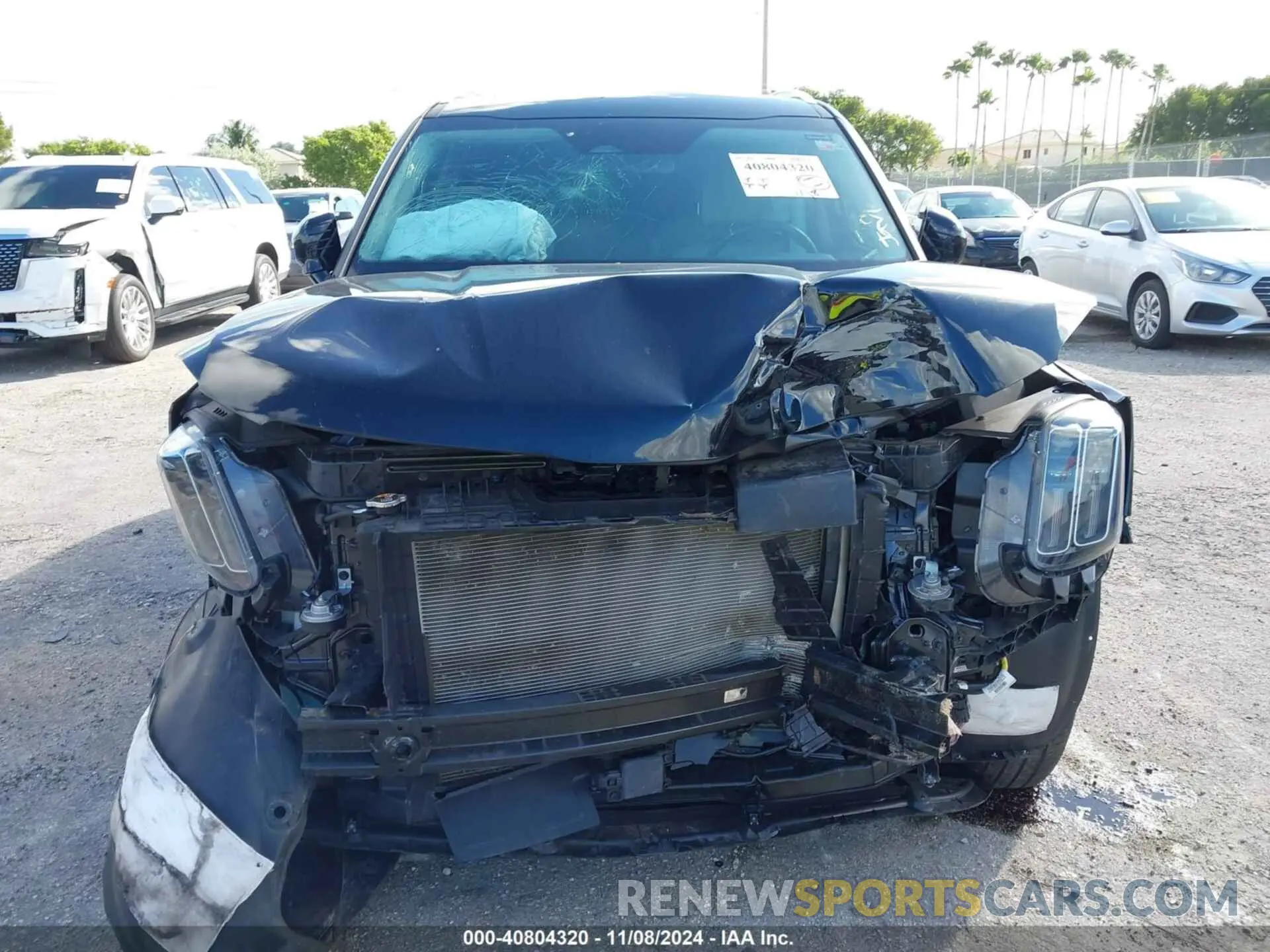 13 Photograph of a damaged car 5XYP54GC9PG401994 KIA TELLURIDE 2023