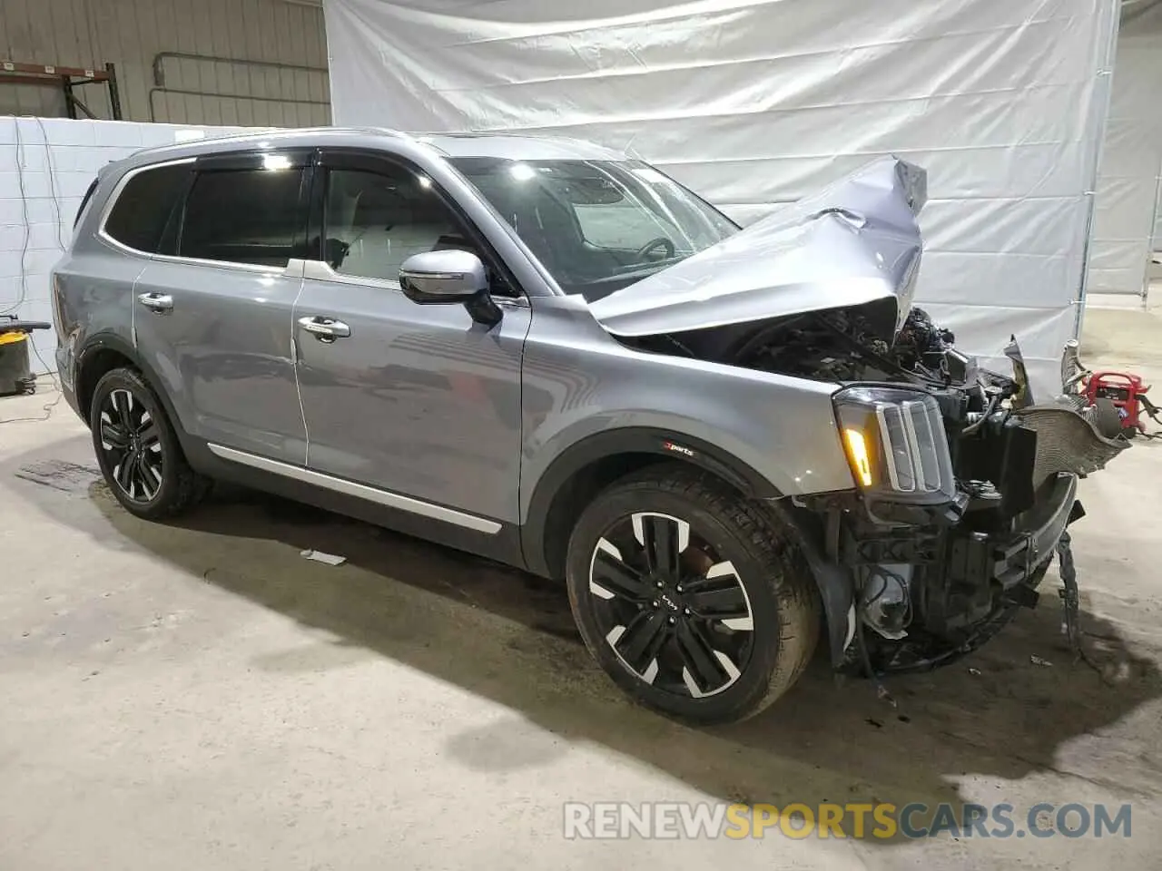 4 Photograph of a damaged car 5XYP5DGC3PG358804 KIA TELLURIDE 2023