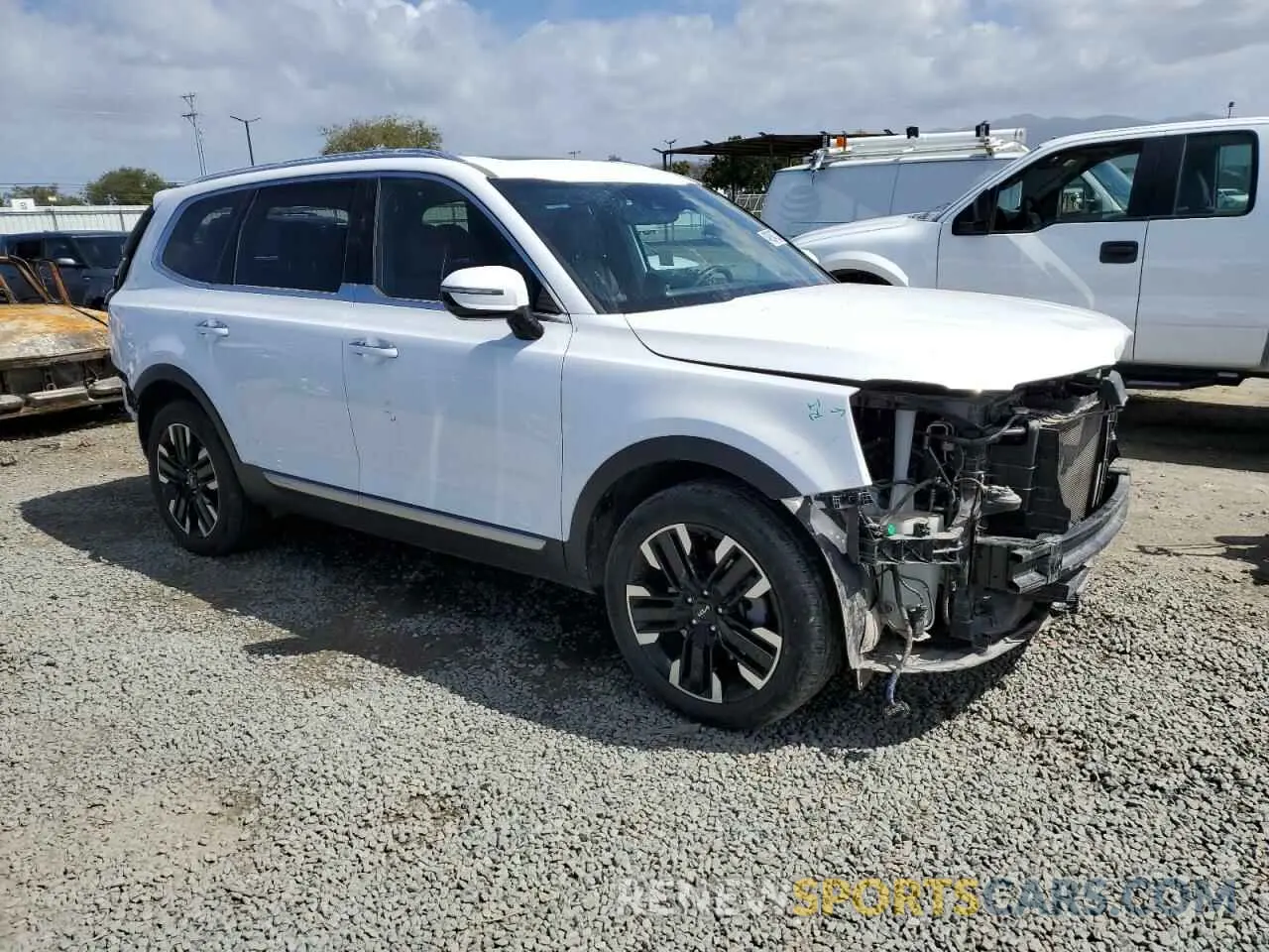 4 Photograph of a damaged car 5XYP5DGC6PG406392 KIA TELLURIDE 2023