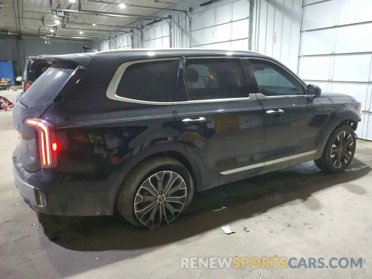 3 Photograph of a damaged car 5XYP5DGC7PG338443 KIA TELLURIDE 2023
