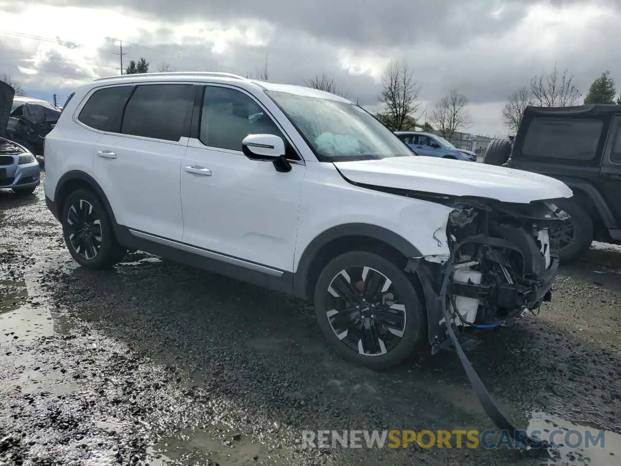 4 Photograph of a damaged car 5XYP5DGC9PG350576 KIA TELLURIDE 2023