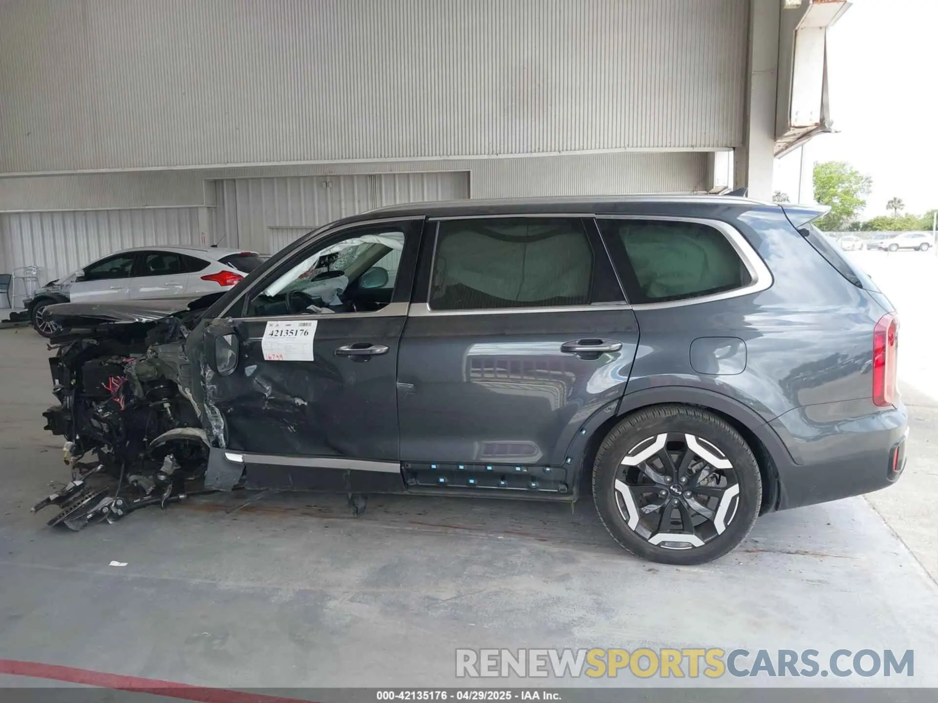 14 Photograph of a damaged car 5XYP6DGC7PG405488 KIA TELLURIDE 2023