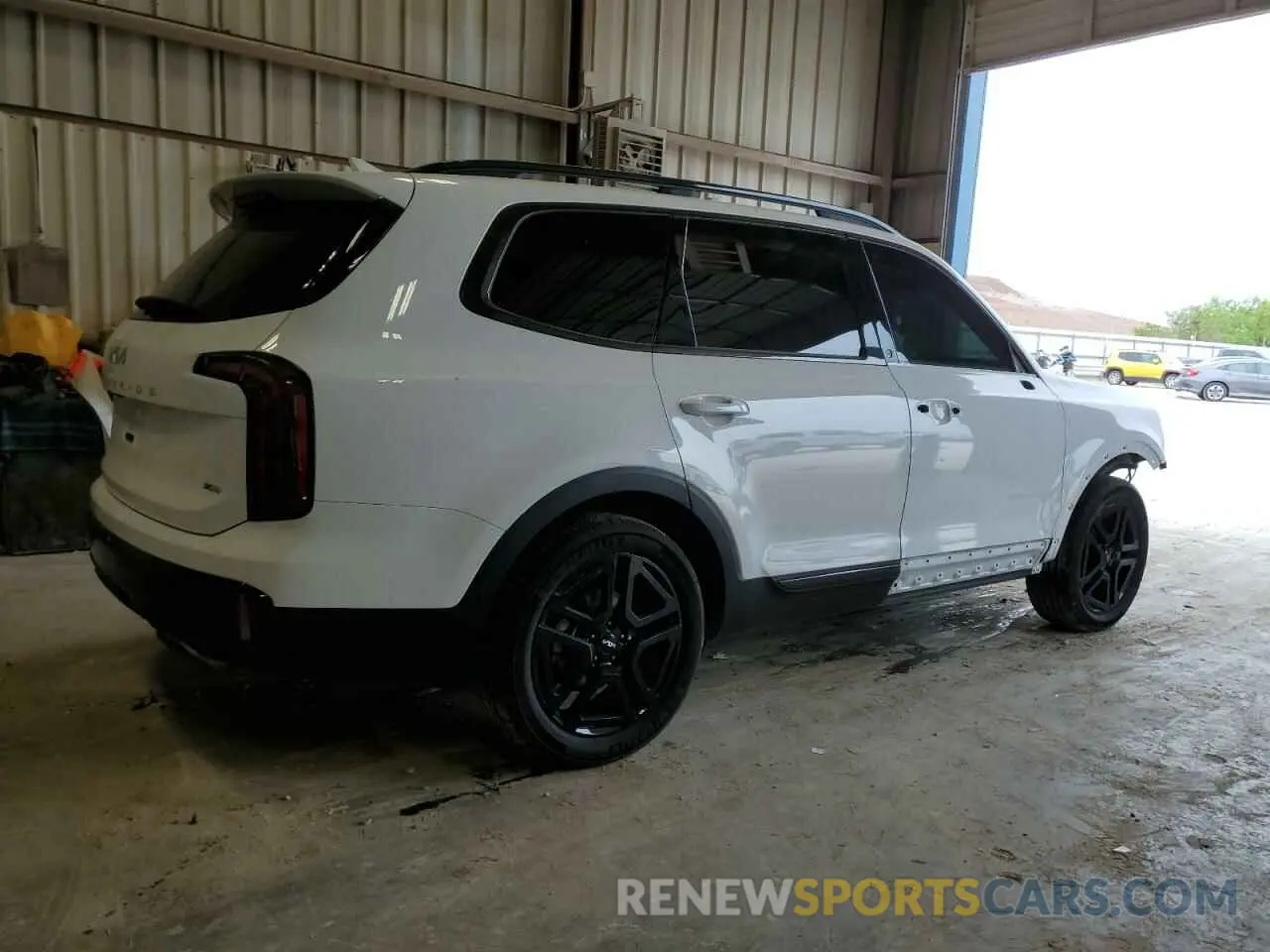 3 Photograph of a damaged car 5XYP3DGC1RG520082 KIA TELLURIDE 2024