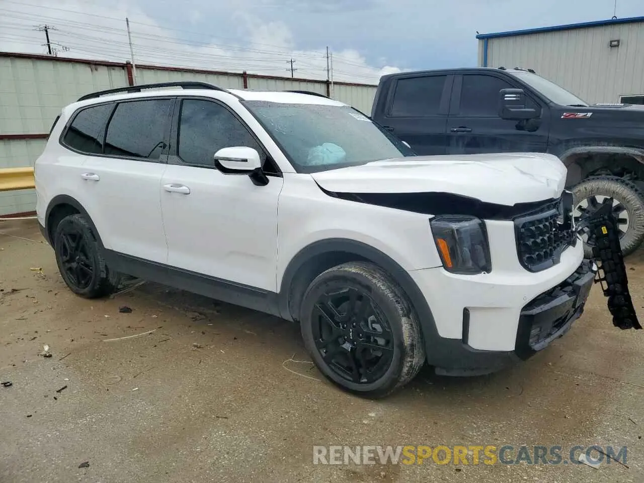 4 Photograph of a damaged car 5XYP5DGC8RG416764 KIA TELLURIDE 2024