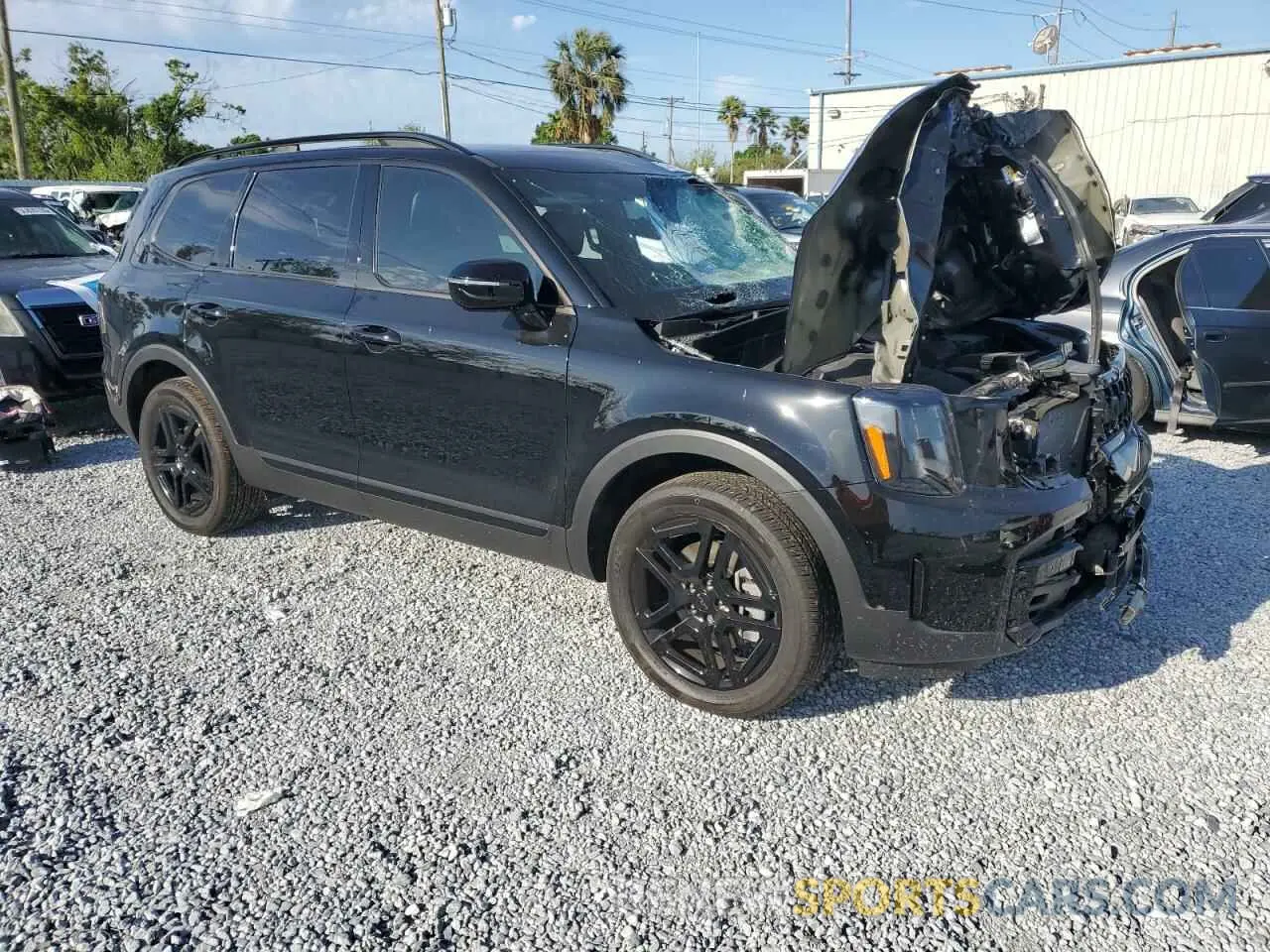4 Photograph of a damaged car 5XYP5DGC9SG573550 KIA TELLURIDE 2025