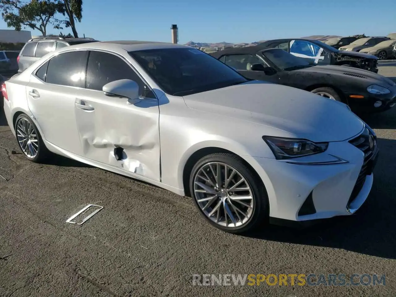 4 Photograph of a damaged car JTHBA1D27K5097273 LEXUS IS 2019