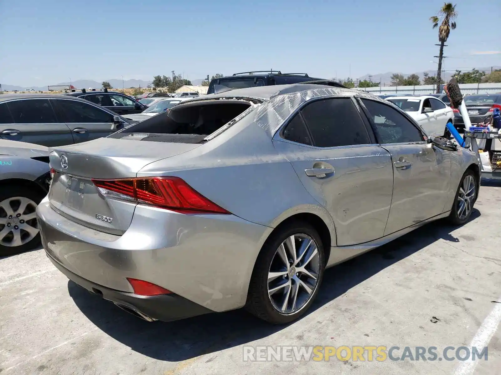 4 Photograph of a damaged car JTHAA1D28L5102638 LEXUS IS 2020