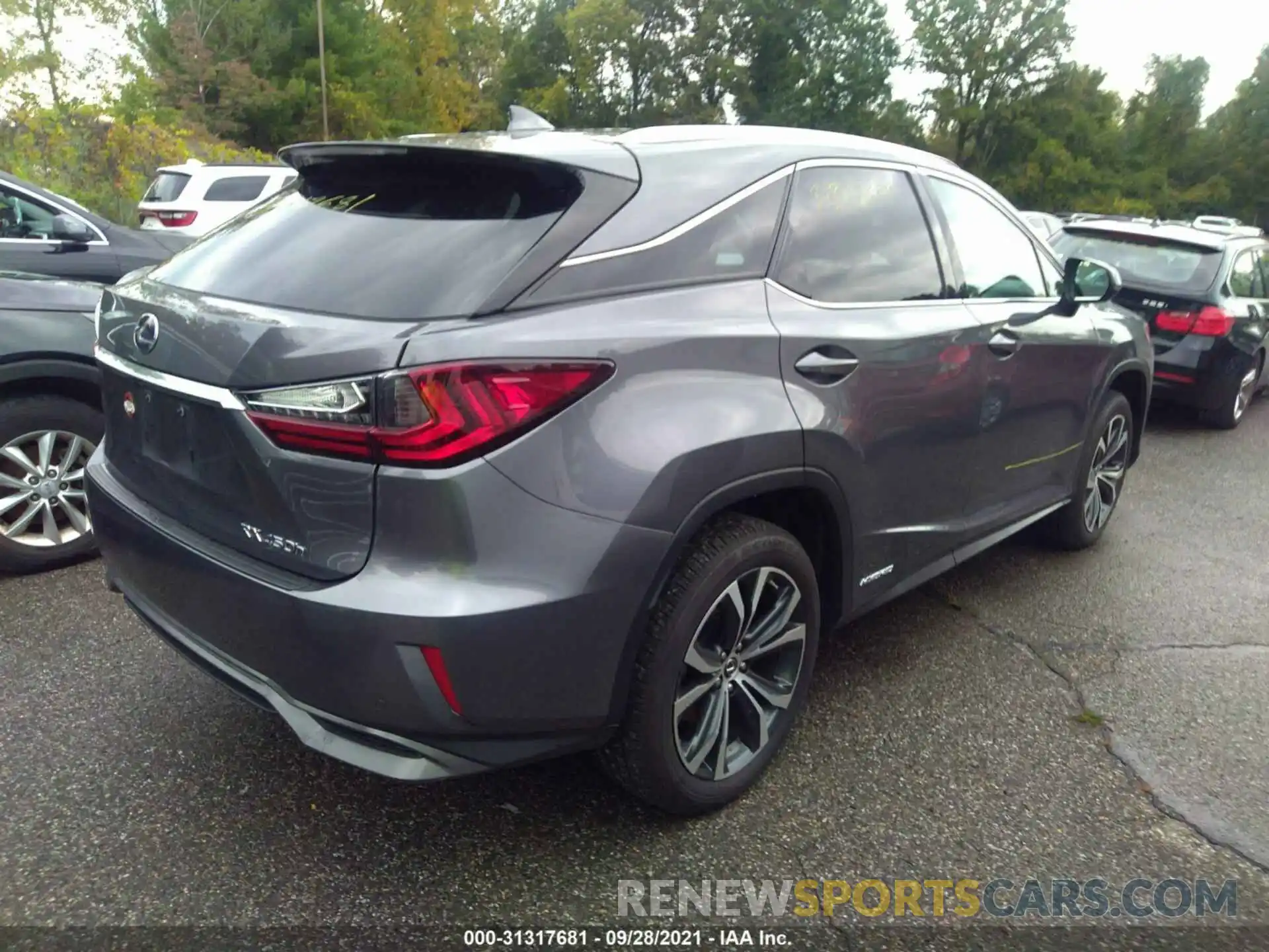 4 Photograph of a damaged car 2T2BGMCA7KC040337 LEXUS RX 2019