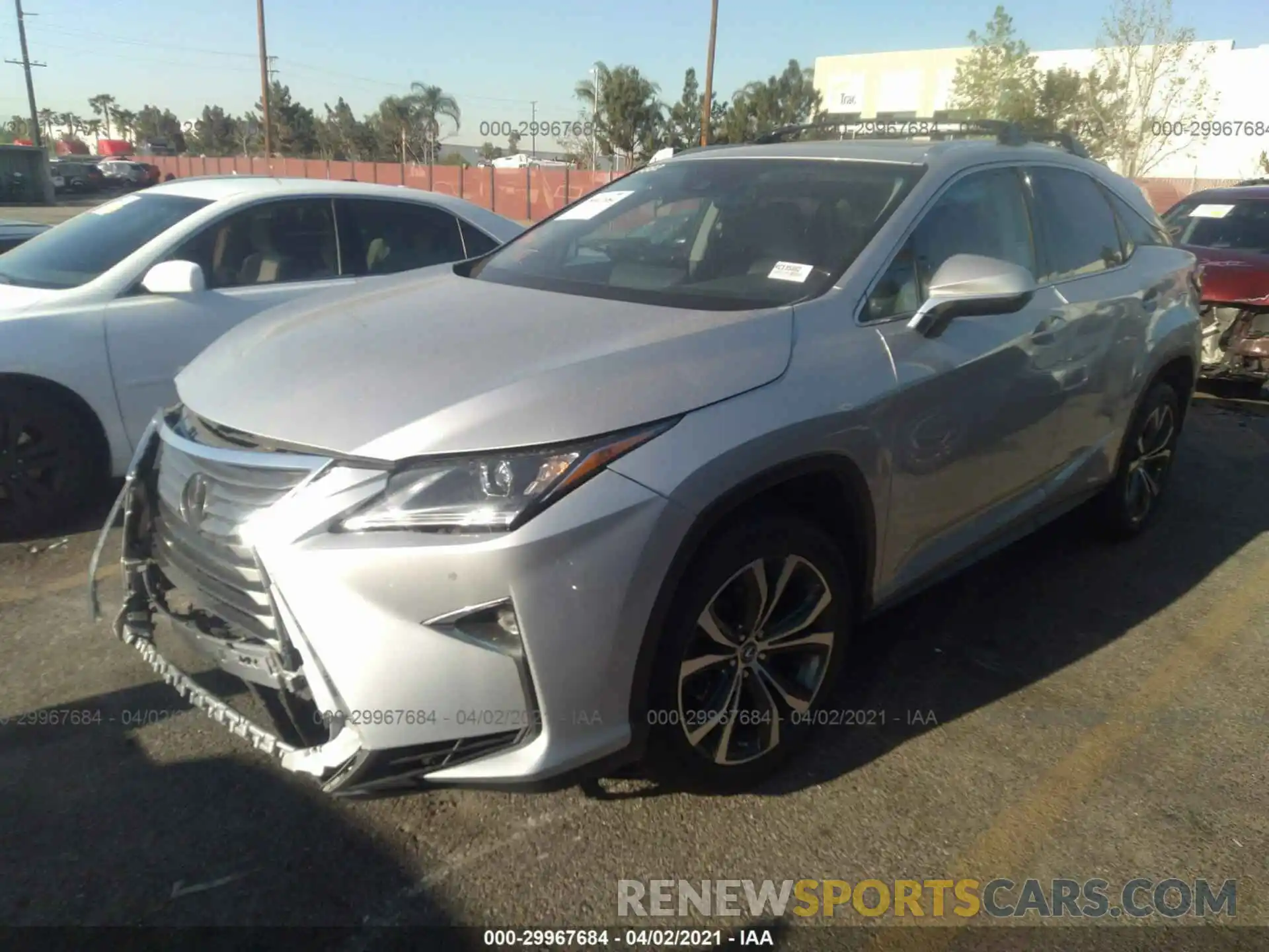 2 Photograph of a damaged car 2T2ZZMCA2KC135882 LEXUS RX 2019