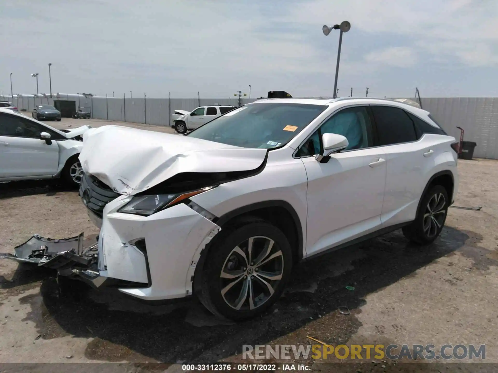 2 Photograph of a damaged car 2T2ZZMCA8KC125163 LEXUS RX 2019