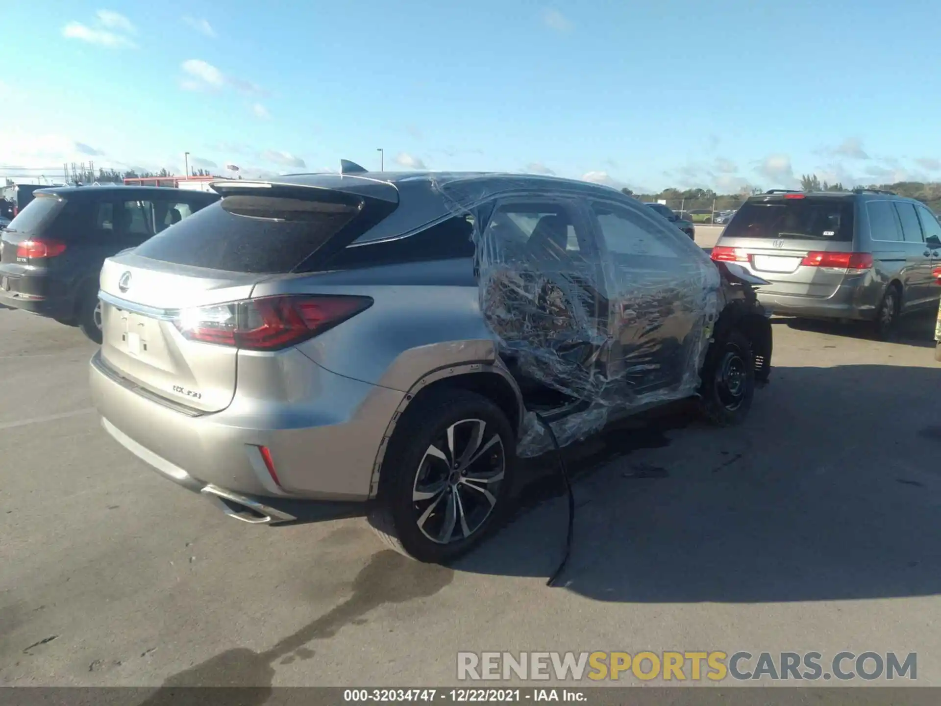 4 Photograph of a damaged car 2T2ZZMCAXKC127688 LEXUS RX 2019