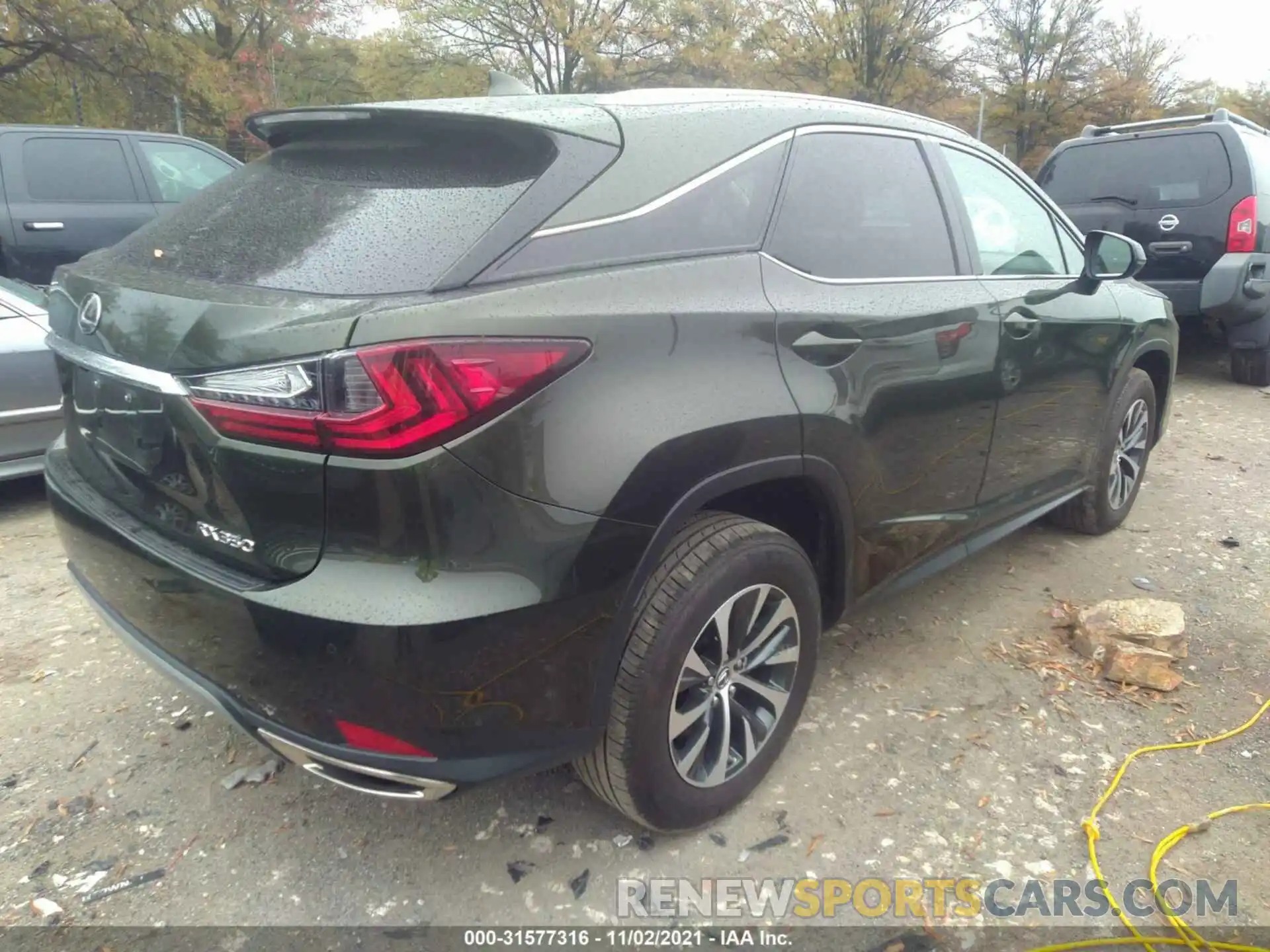 4 Photograph of a damaged car 2T2HZMDA3LC239499 LEXUS RX 2020