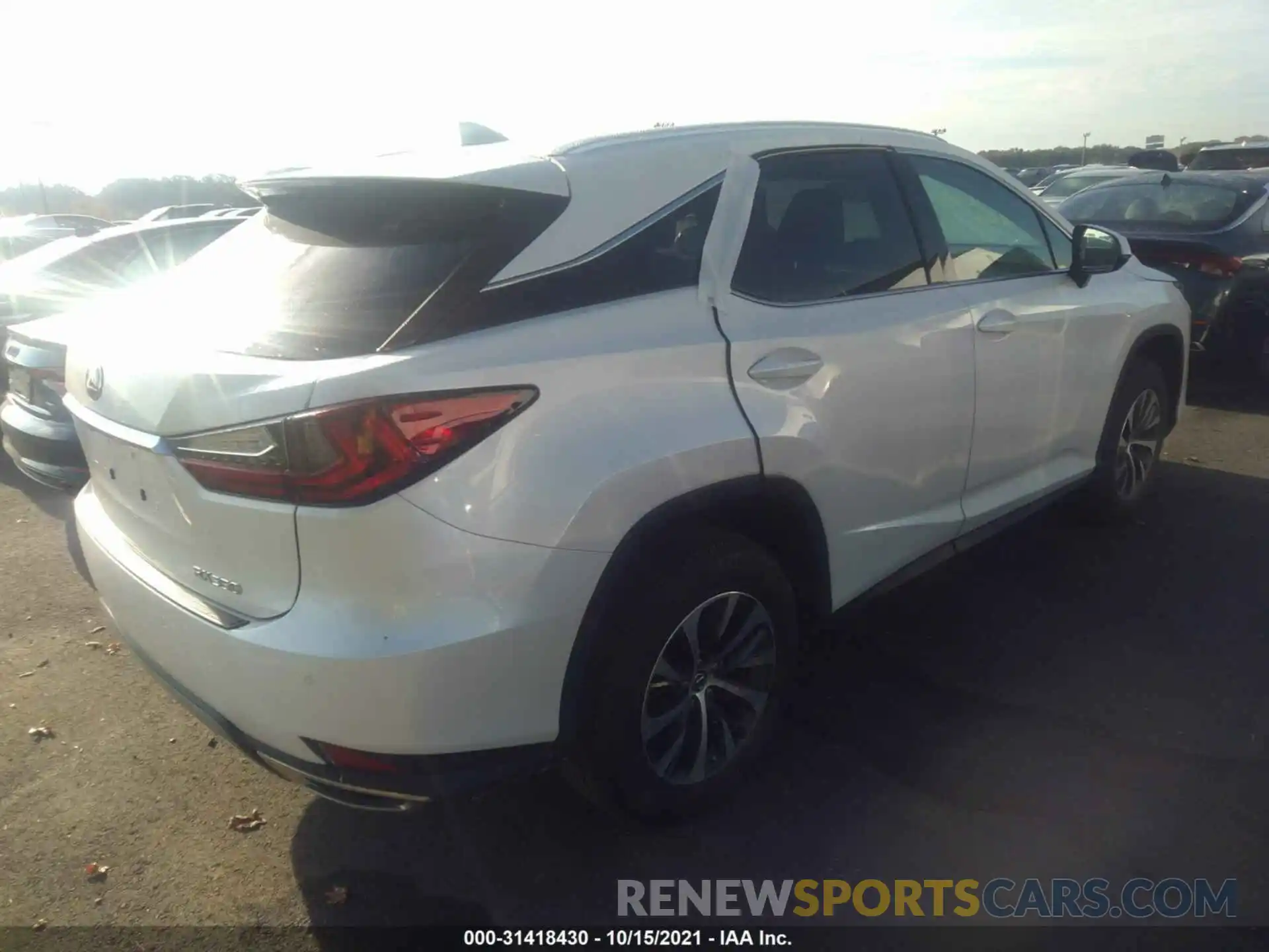 4 Photograph of a damaged car 2T2HZMDA6MC277889 LEXUS RX 2021