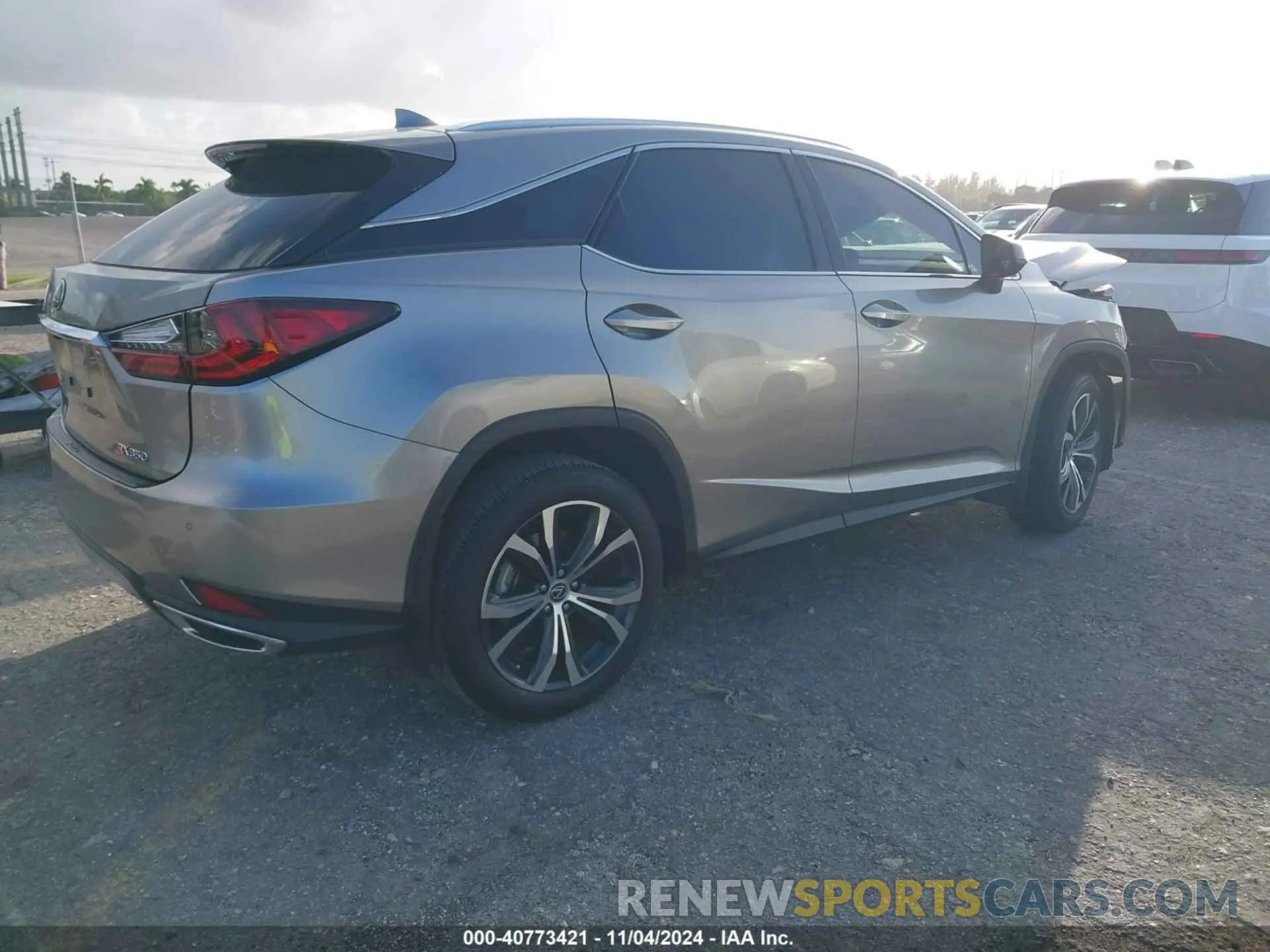 4 Photograph of a damaged car 2T2HZMAAXNC252077 LEXUS RX 350 2022