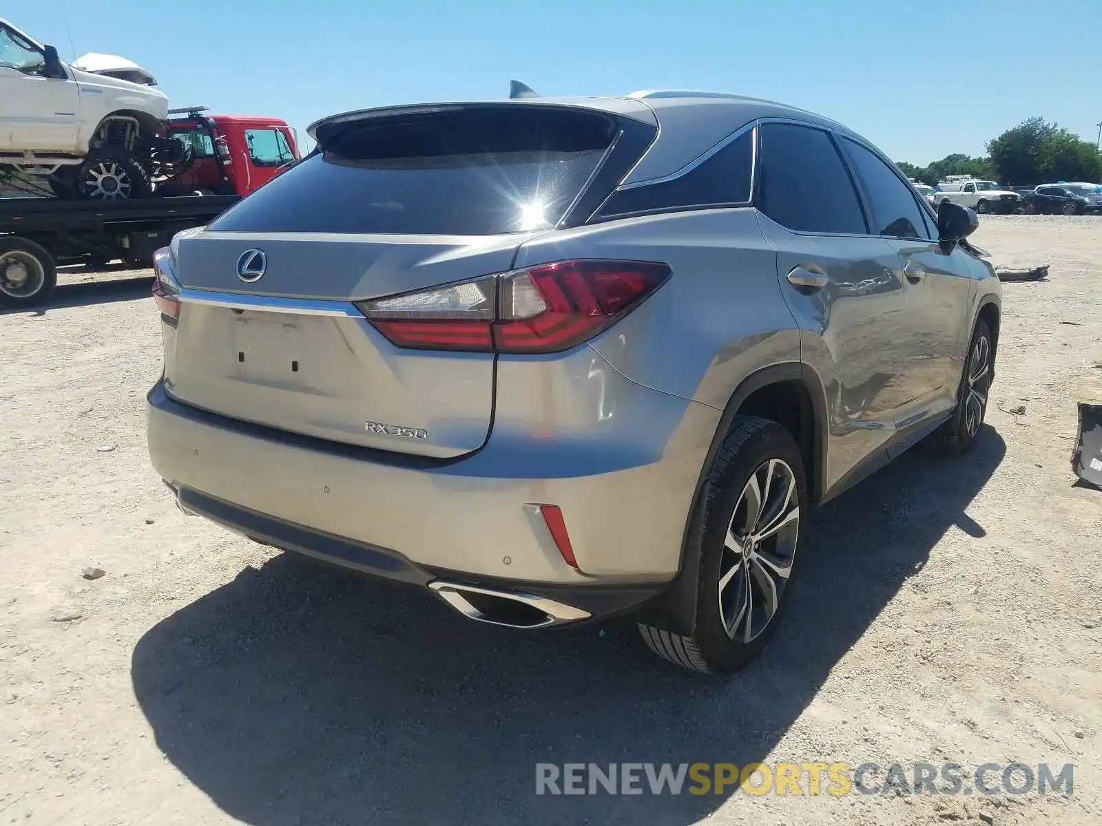 4 Photograph of a damaged car 2T2ZZMCA3KC144526 LEXUS RX 350 BAS 2019