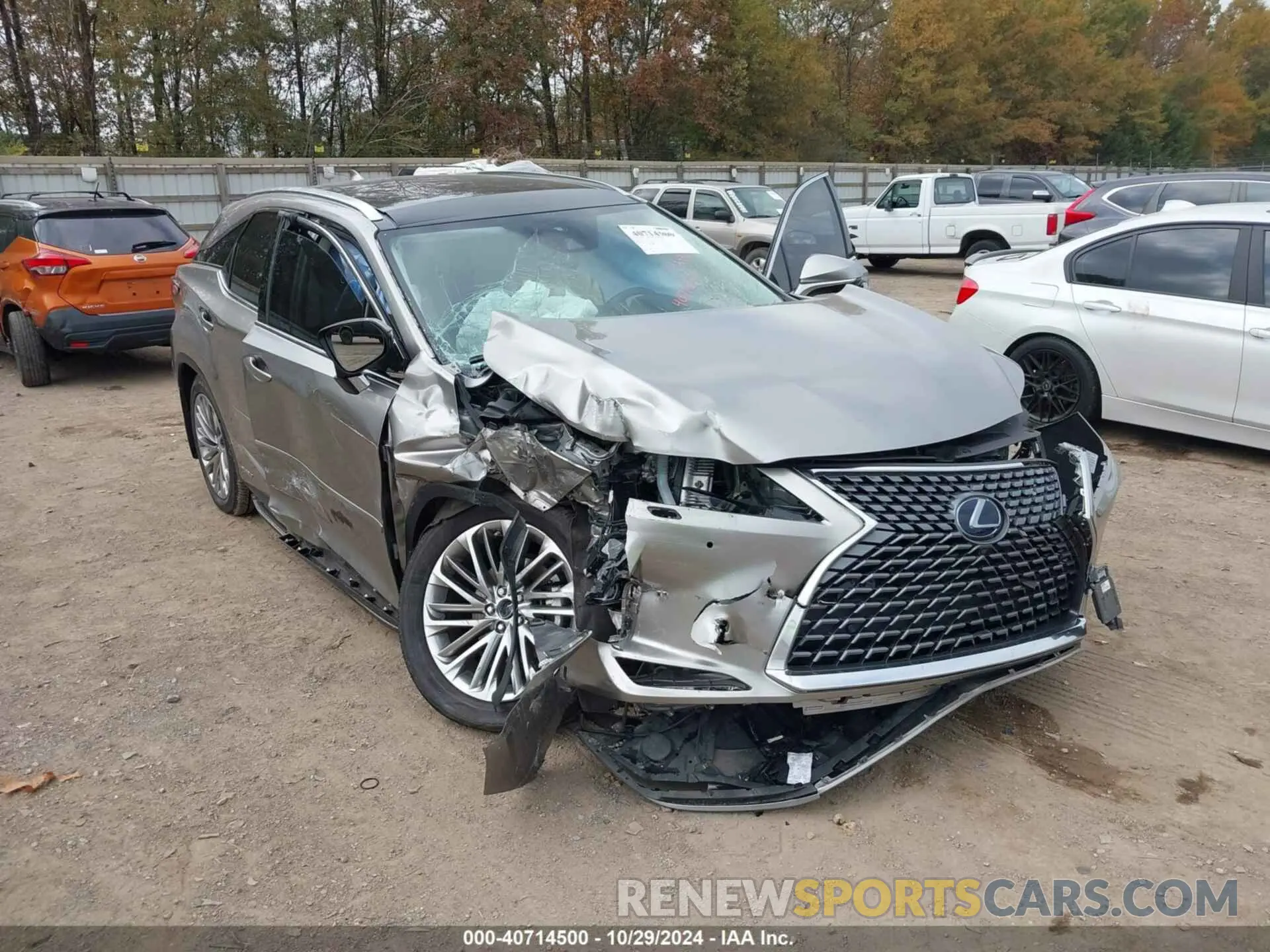 11 Photograph of a damaged car 2T2JGMDA9MC059159 LEXUS RX 450H 2021