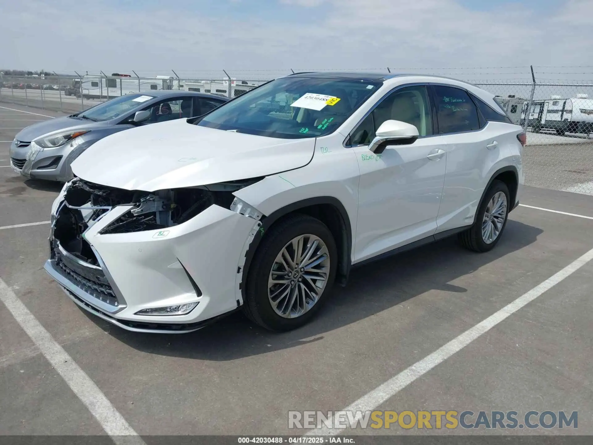 2 Photograph of a damaged car 2T2JGMDA1NC076975 LEXUS RX 450H 2022