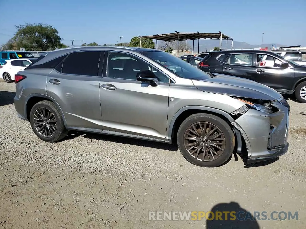 4 Photograph of a damaged car 2T2BZMCA2KC174313 LEXUS RX350 2019