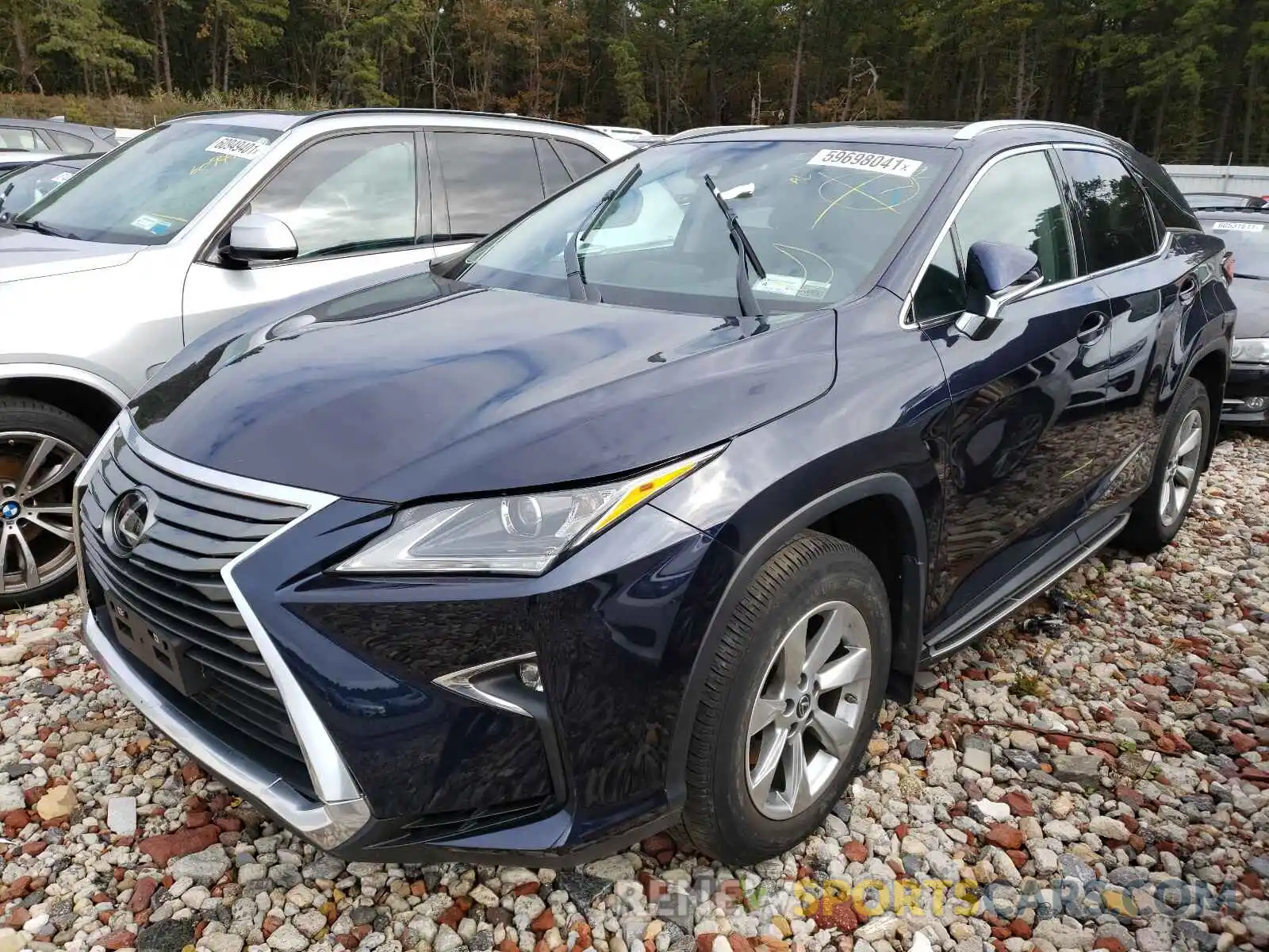 2 Photograph of a damaged car 2T2BZMCA4KC191114 LEXUS RX350 2019